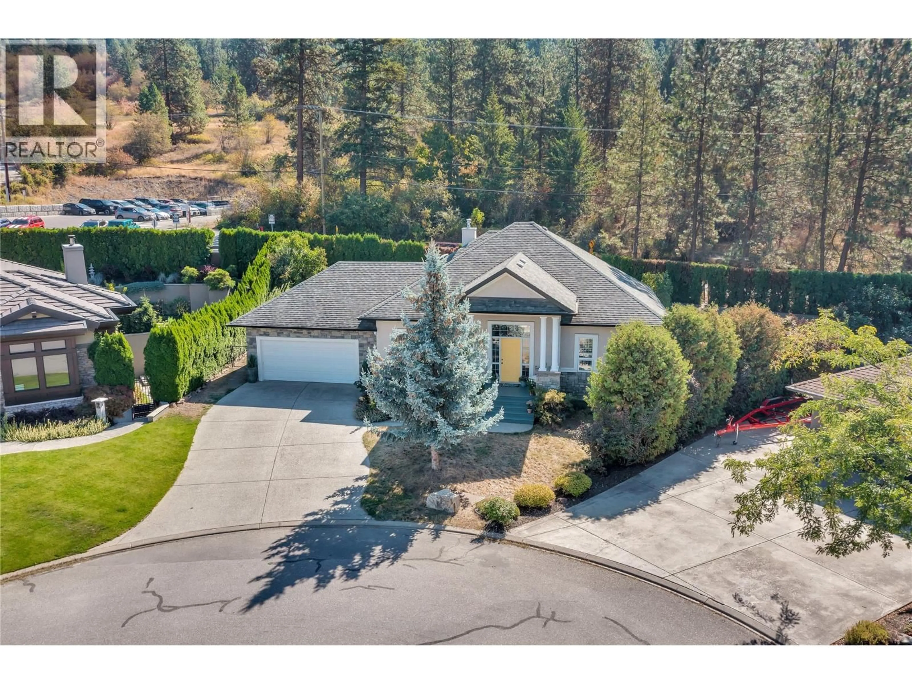 A pic from outside/outdoor area/front of a property/back of a property/a pic from drone, street for 7 - 13341 KIDSTON ROAD, Coldstream British Columbia V1B1Z4