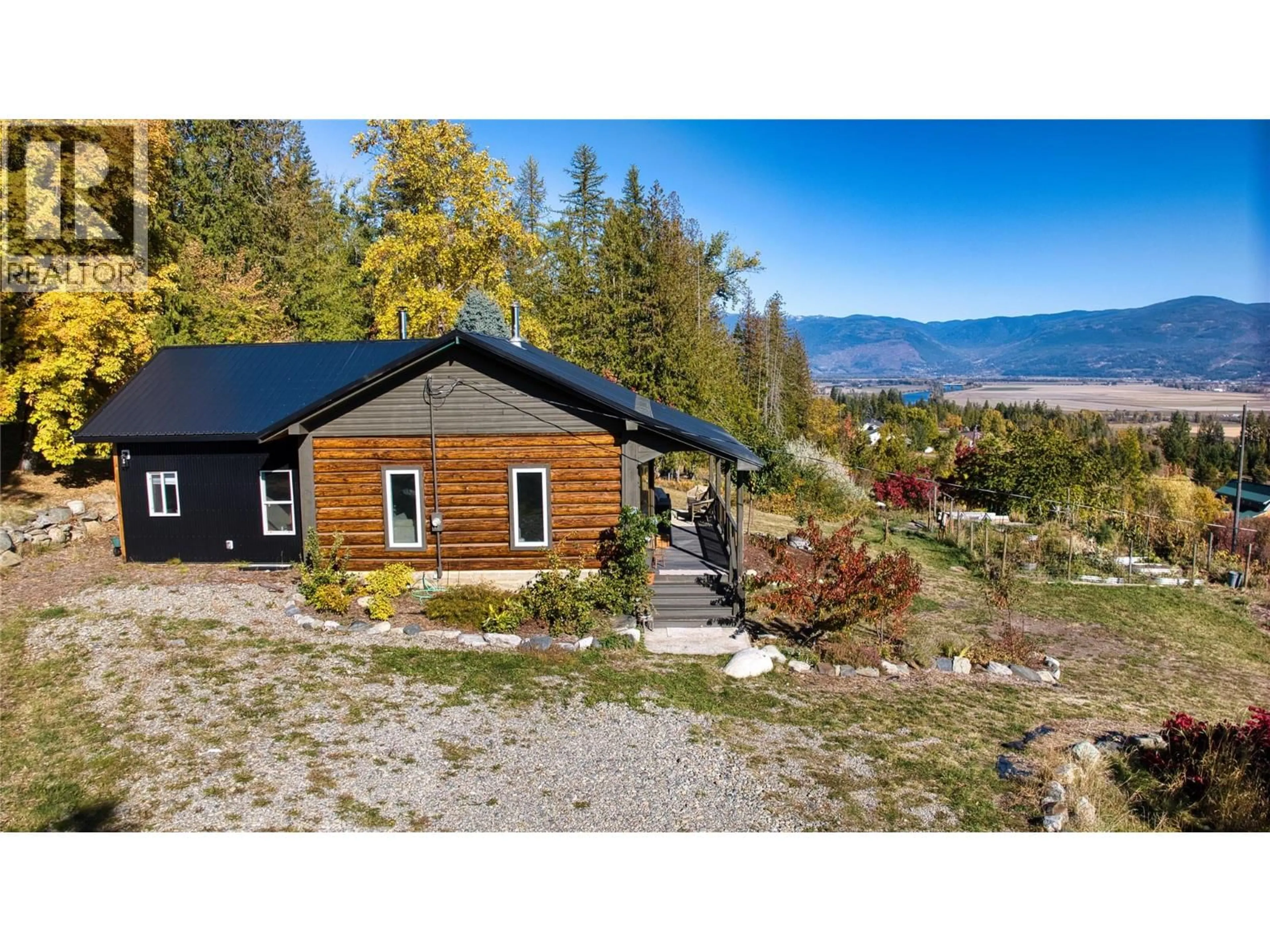 A pic from outside/outdoor area/front of a property/back of a property/a pic from drone, mountain view for 1017 SIMMONS ROAD, Creston British Columbia V0B1G7