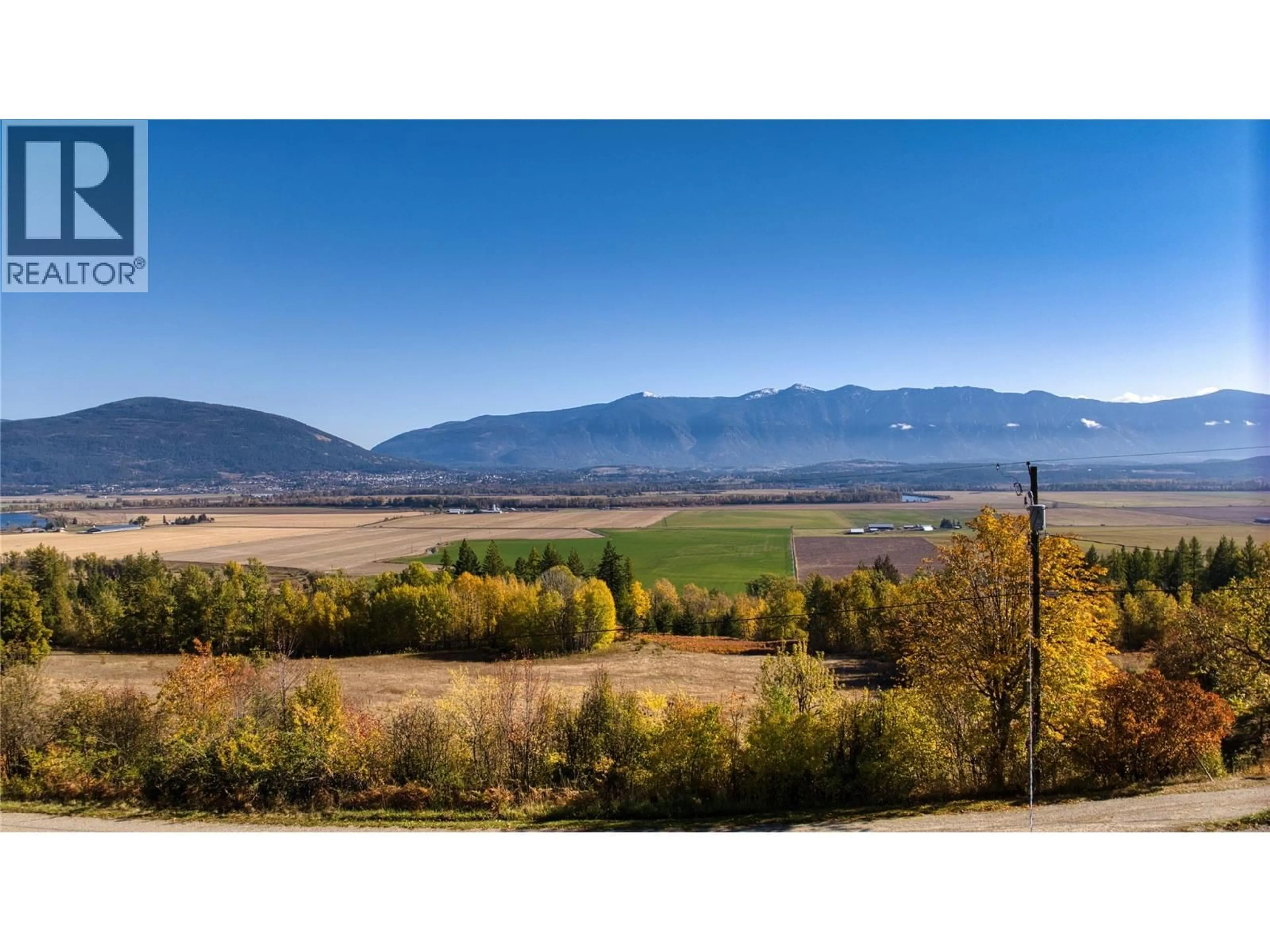 A pic from outside/outdoor area/front of a property/back of a property/a pic from drone, mountain view for 1017 SIMMONS ROAD, Creston British Columbia V0B1G7