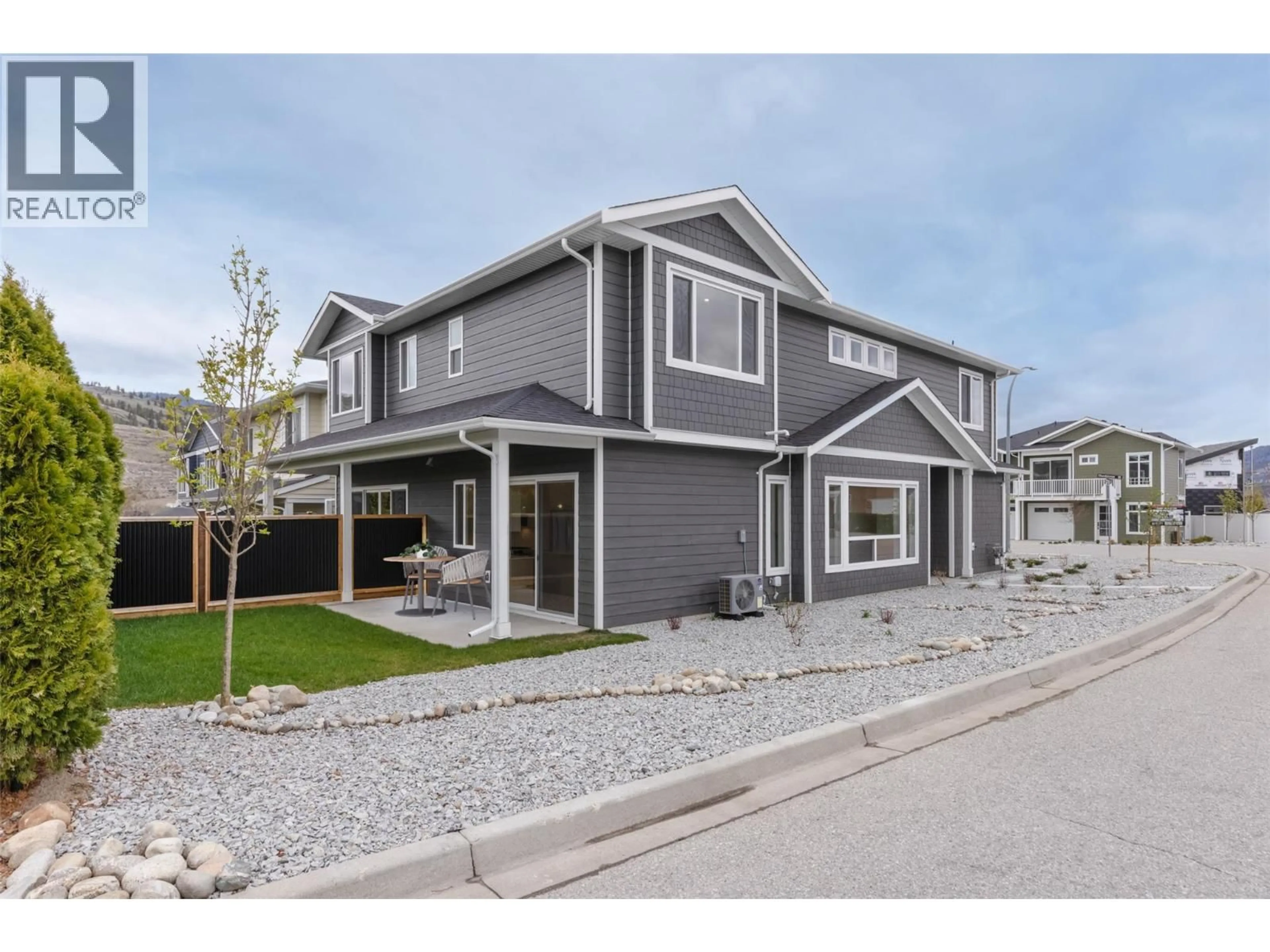 Home with vinyl exterior material, street for 397 CHARDONNAY AVENUE, Oliver British Columbia V0H1T4