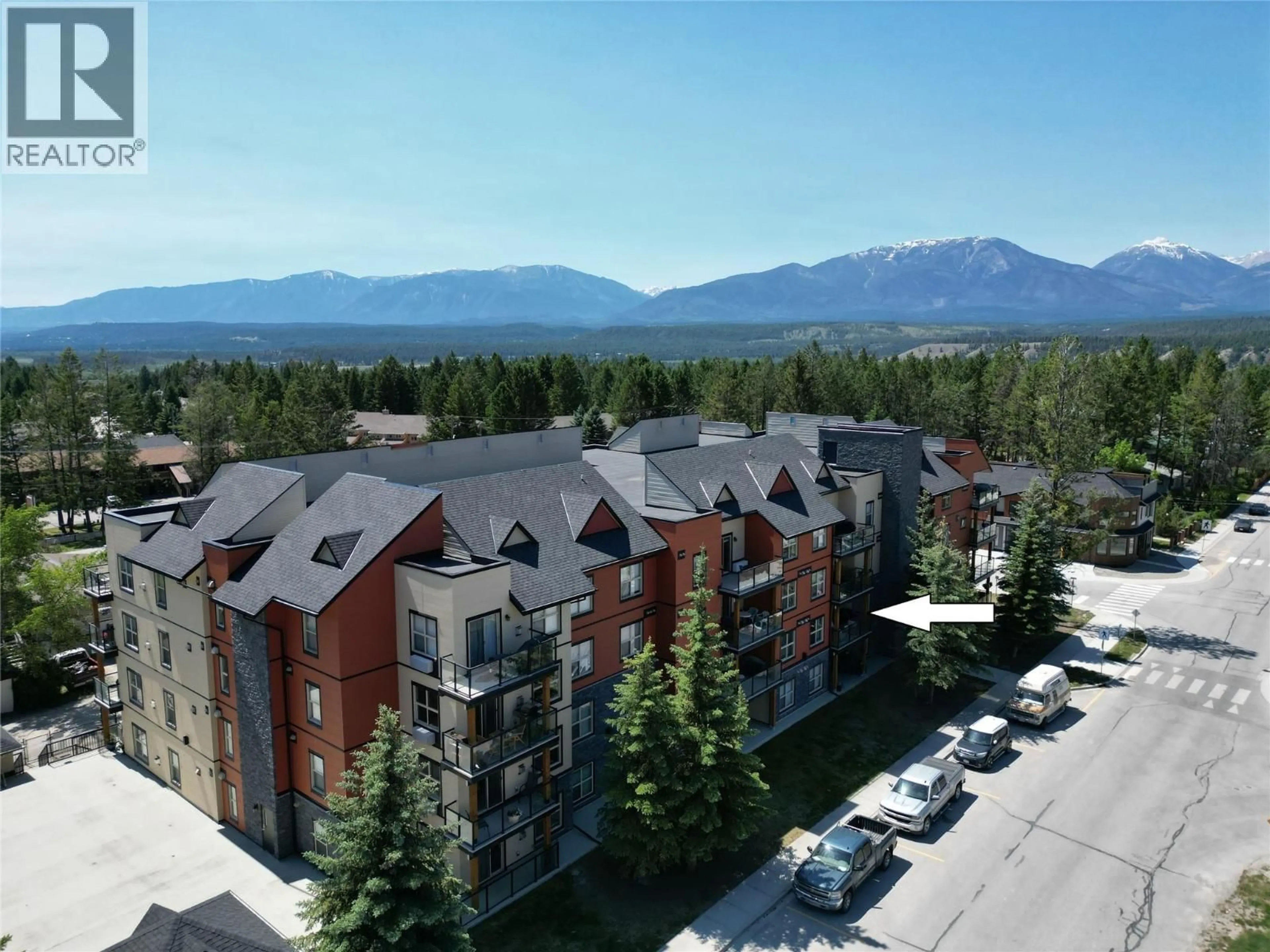 A pic from outside/outdoor area/front of a property/back of a property/a pic from drone, mountain view for 205 - 4874 STANLEY STREET, Radium Hot Springs British Columbia V0A1M0