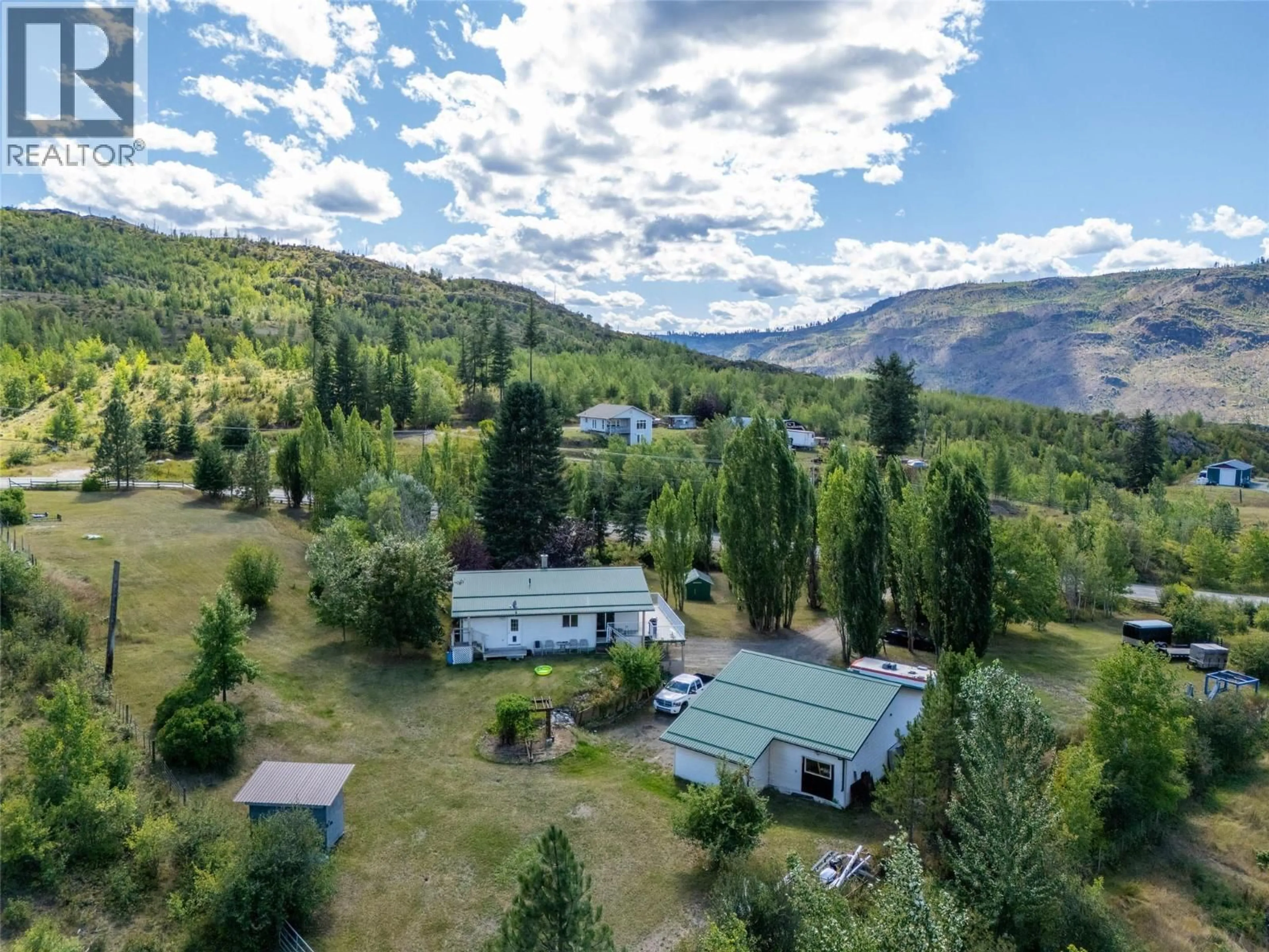 A pic from outside/outdoor area/front of a property/back of a property/a pic from drone, mountain view for 3998 AGATE BAY ROAD, Barriere British Columbia V0E2E0