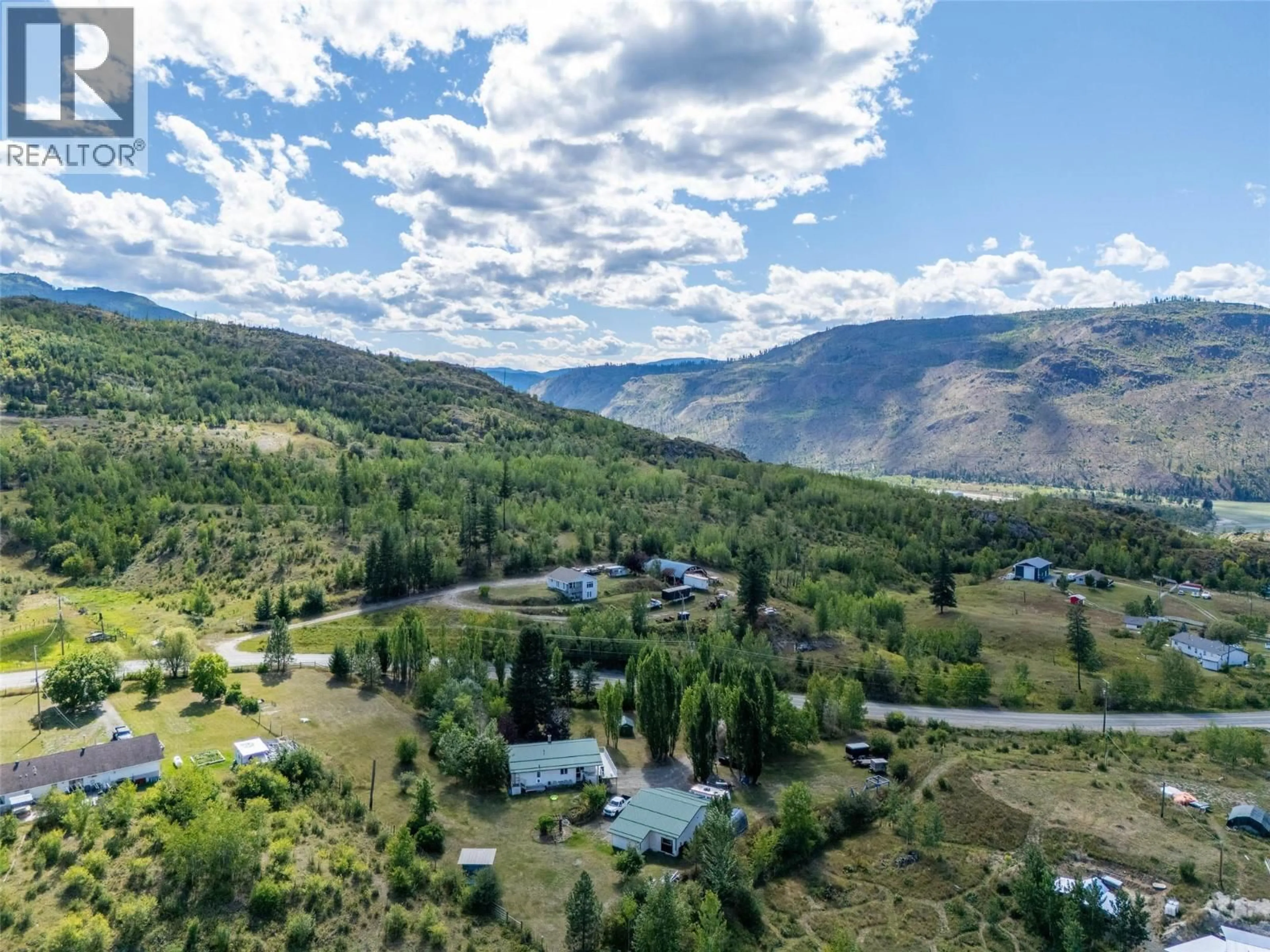 A pic from outside/outdoor area/front of a property/back of a property/a pic from drone, mountain view for 3998 AGATE BAY ROAD, Barriere British Columbia V0E2E0