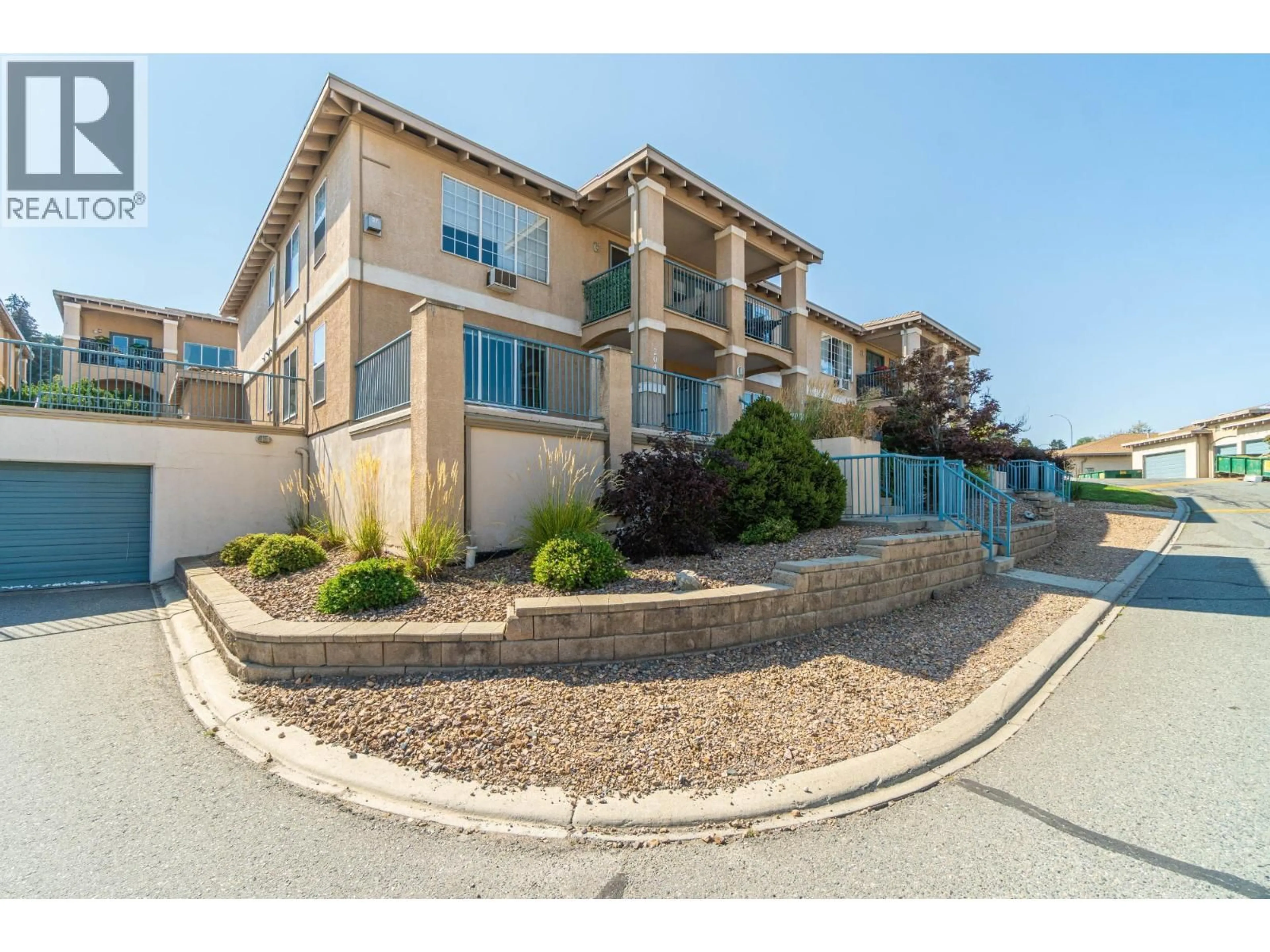 A pic from outside/outdoor area/front of a property/back of a property/a pic from drone, street for 204 - 875 SAHALI TERRACE, Kamloops British Columbia V2C6W8