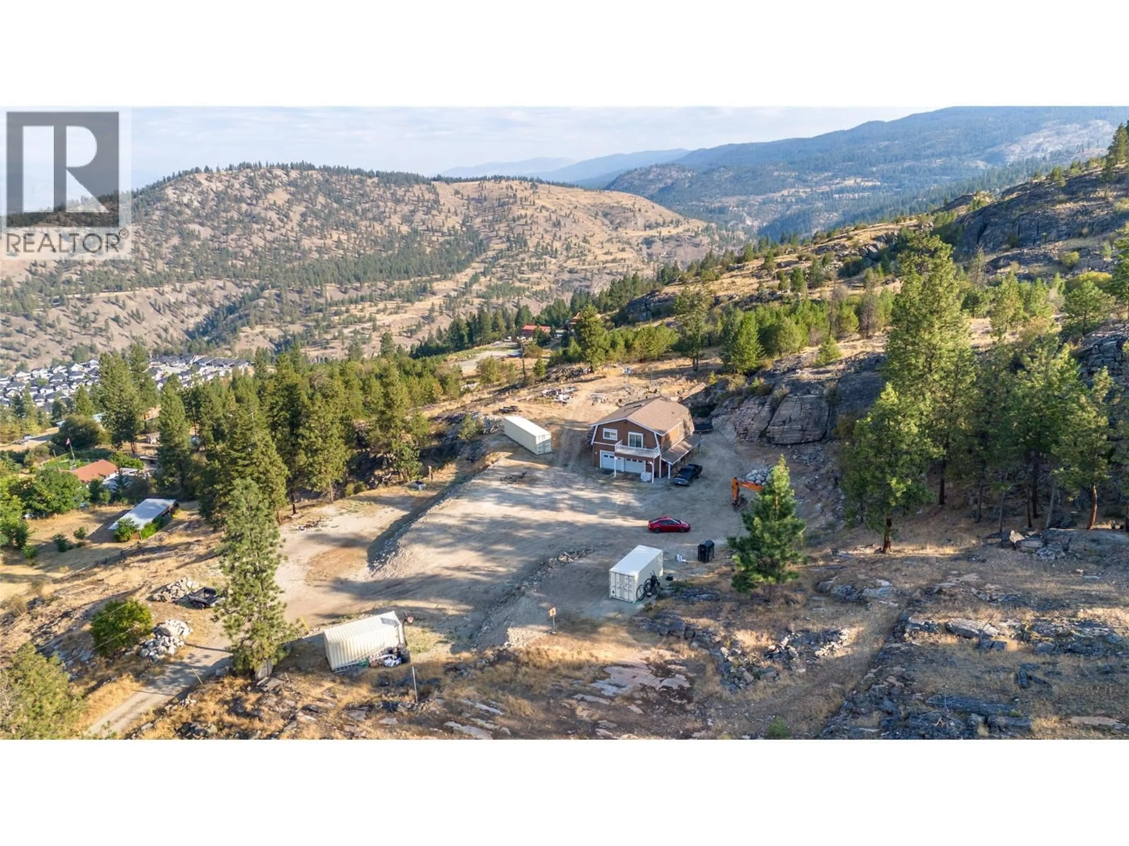 A pic from outside/outdoor area/front of a property/back of a property/a pic from drone, mountain view for 2063 CARMI ROAD, Penticton British Columbia V2A8V5