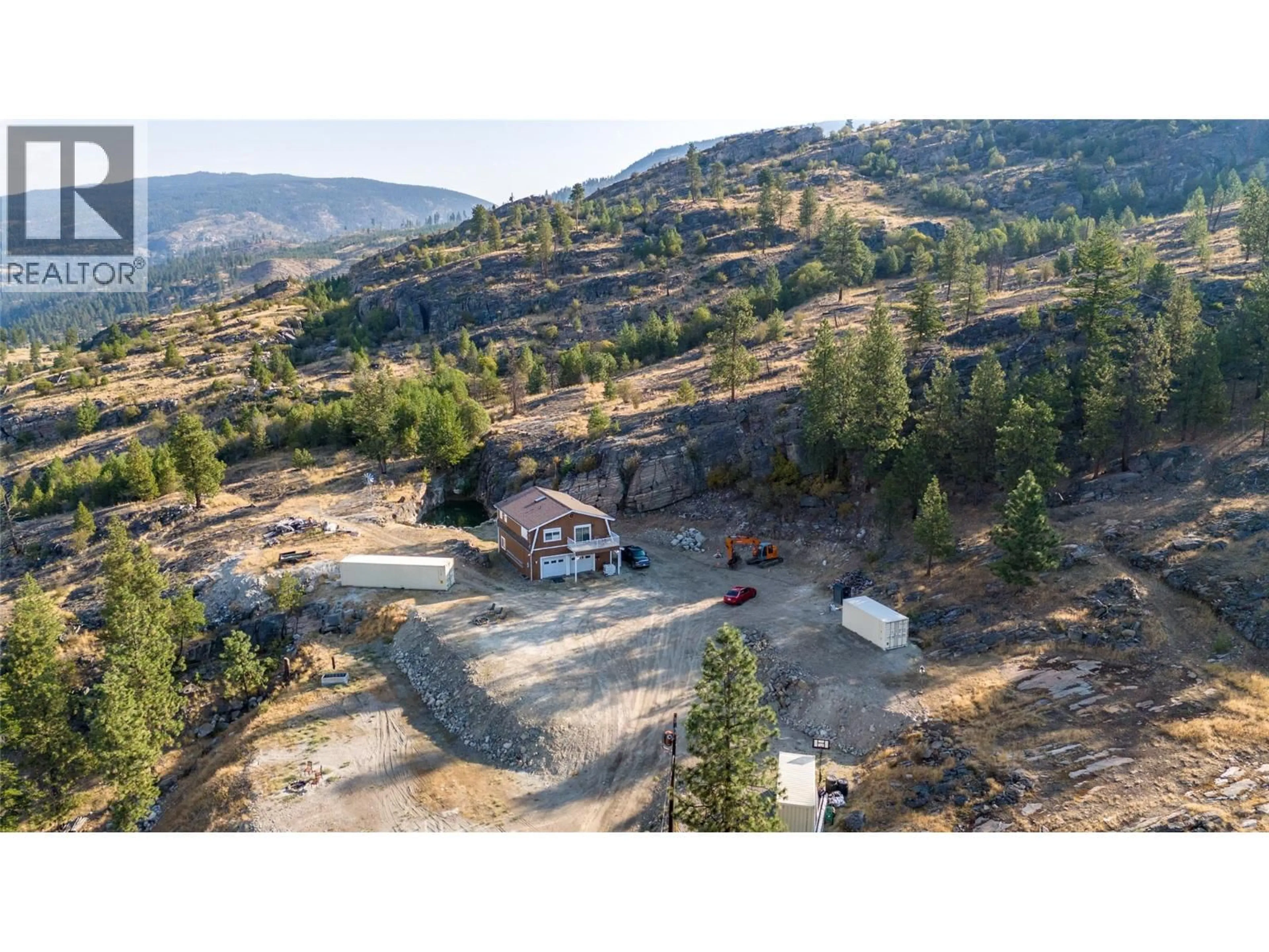 A pic from outside/outdoor area/front of a property/back of a property/a pic from drone, mountain view for 2063 CARMI ROAD, Penticton British Columbia V2A8V5