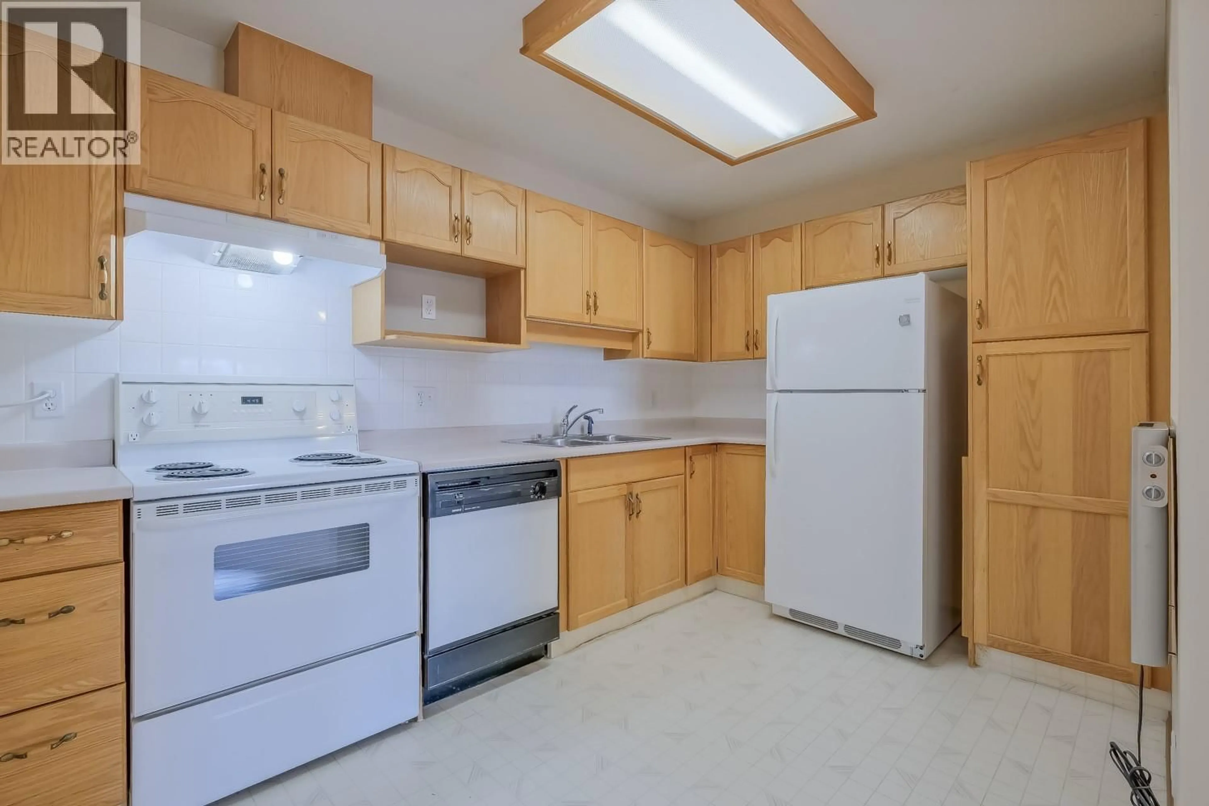 Standard kitchen, unknown for 211 - 130 ABBOTT STREET, Penticton British Columbia V2A8P3