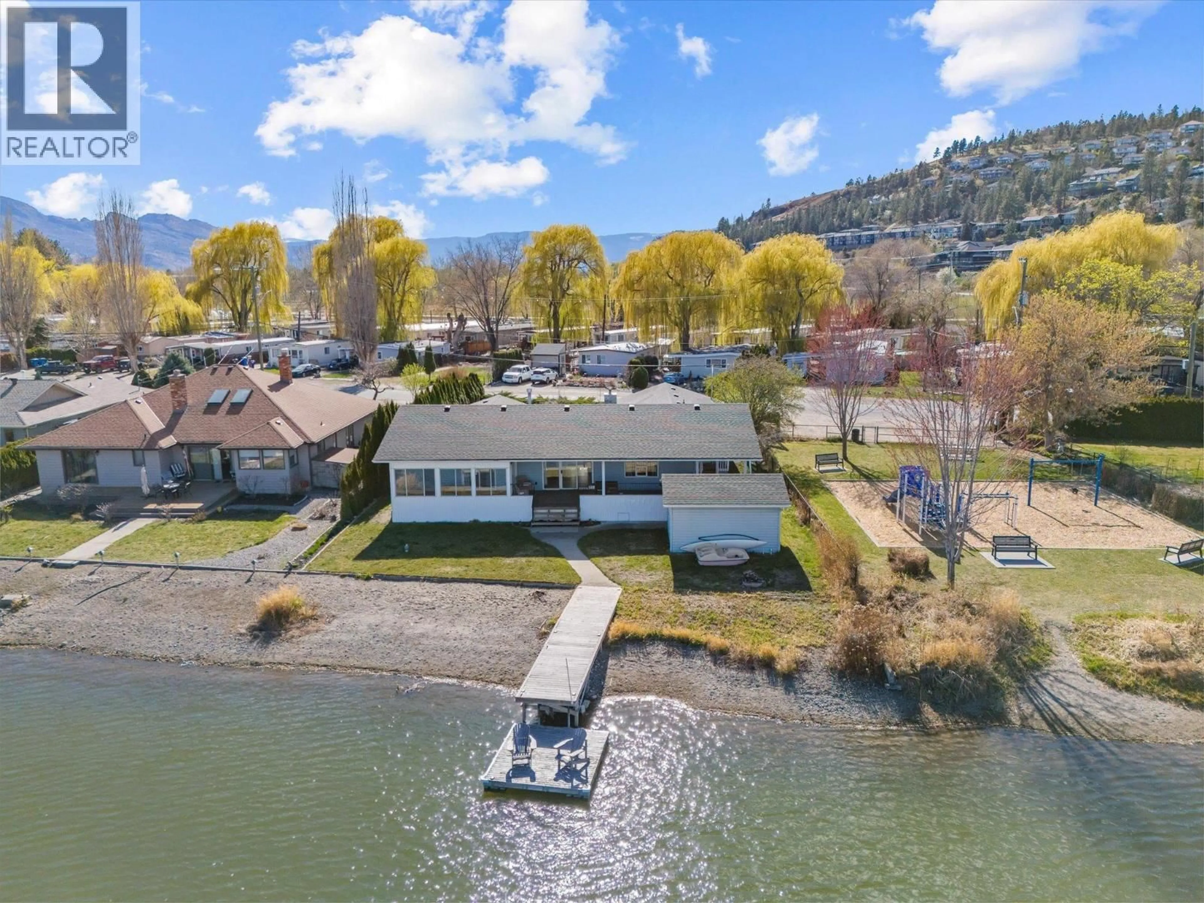 A pic from outside/outdoor area/front of a property/back of a property/a pic from drone, water/lake/river/ocean view for 1428 GREEN BAY ROAD, West Kelowna British Columbia V4T2B8