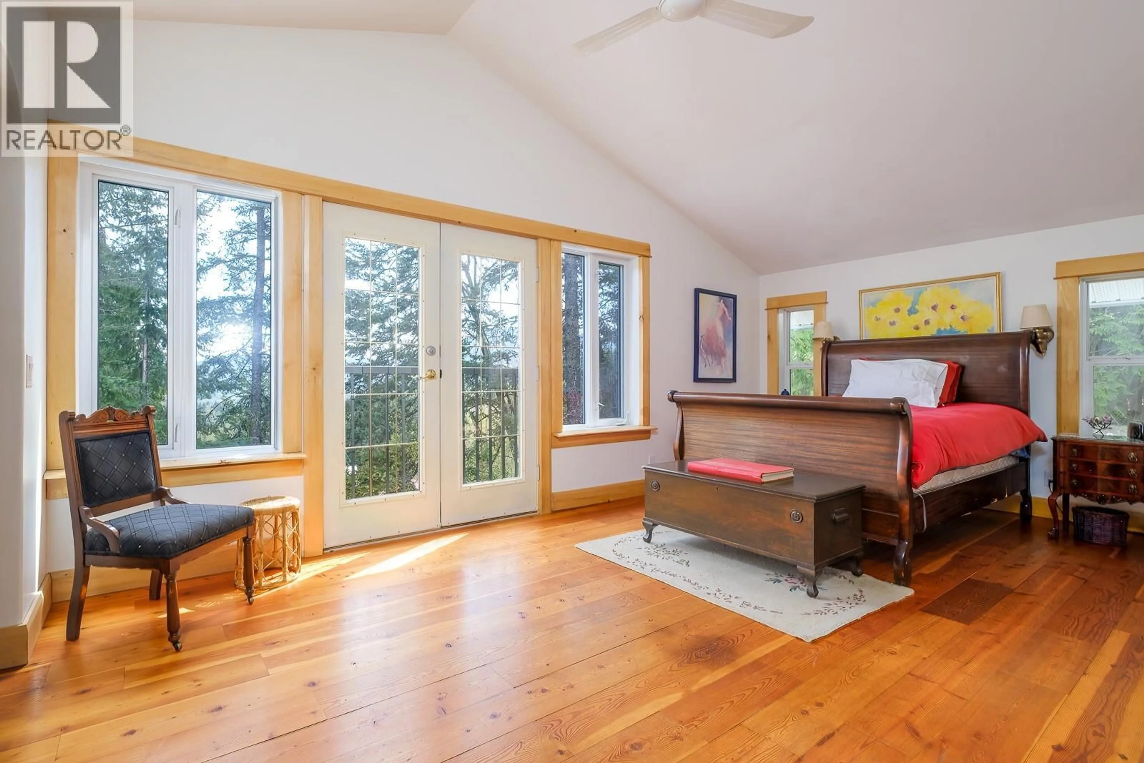 Bedroom with bed, wood/laminate floor for 1285 BLACK BEAR DRIVE, Rossland British Columbia V0G1Y0