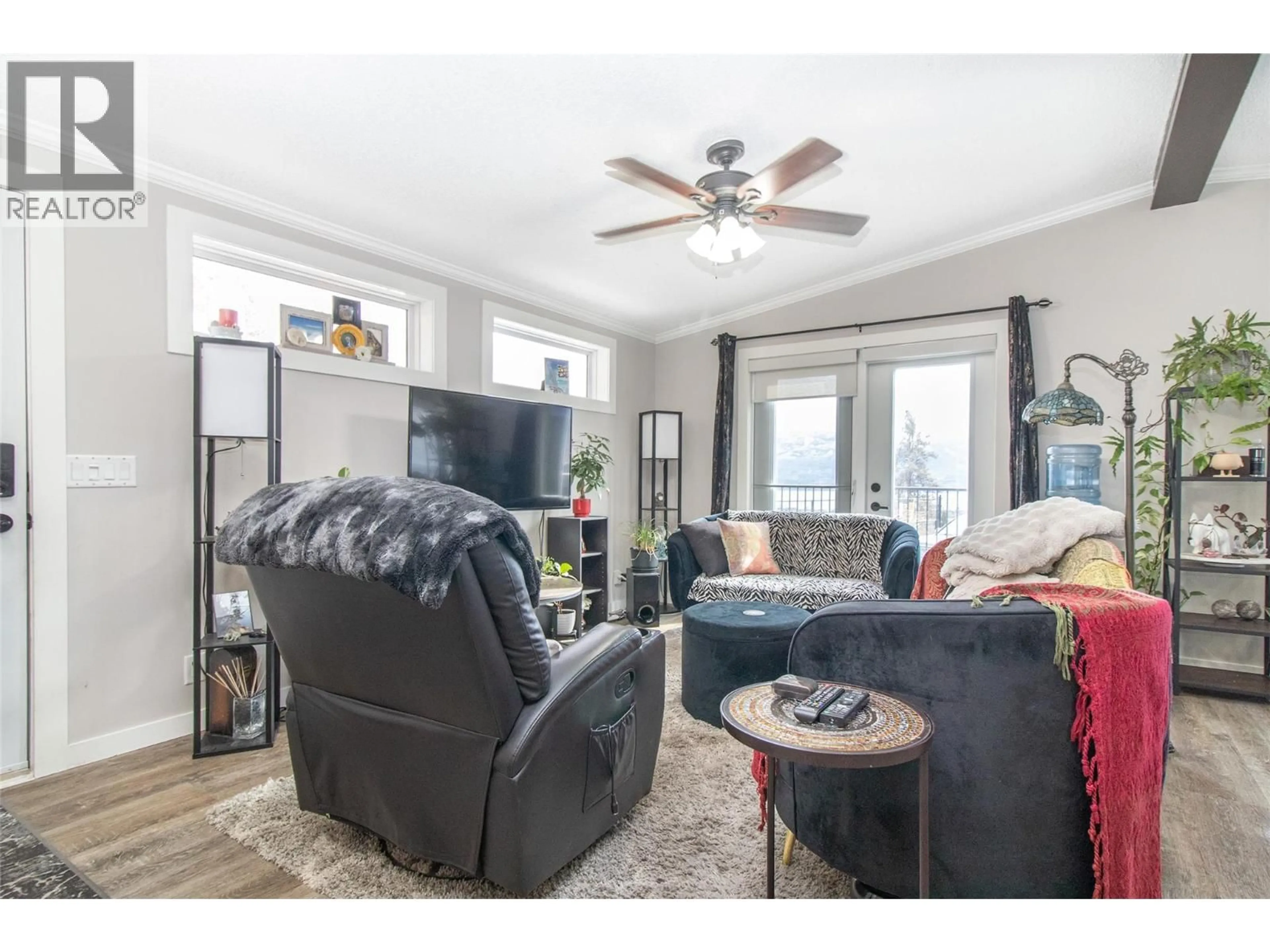 Living room with furniture, wood/laminate floor for 1329 - 2440 OLD OKANAGAN HIGHWAY, West Kelowna British Columbia V4T3A2