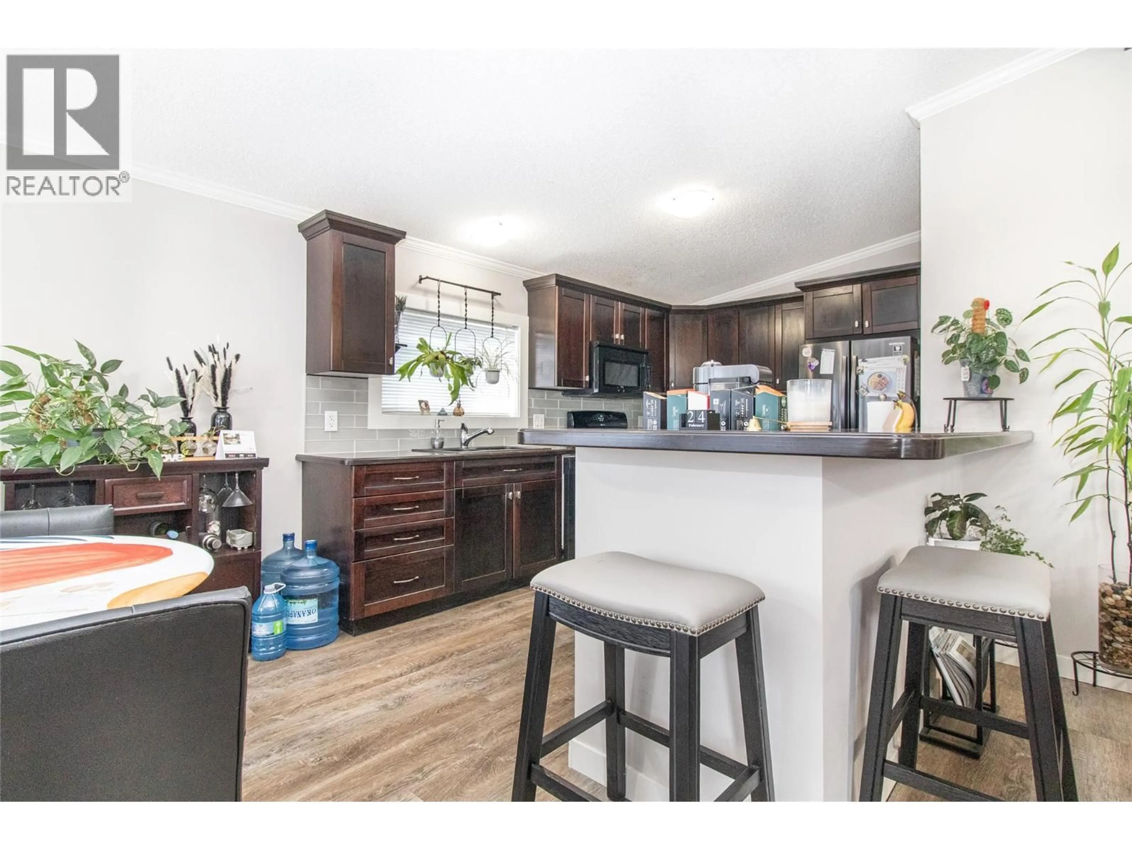 Open concept kitchen, wood/laminate floor for 1329 - 2440 OLD OKANAGAN HIGHWAY, West Kelowna British Columbia V4T3A2
