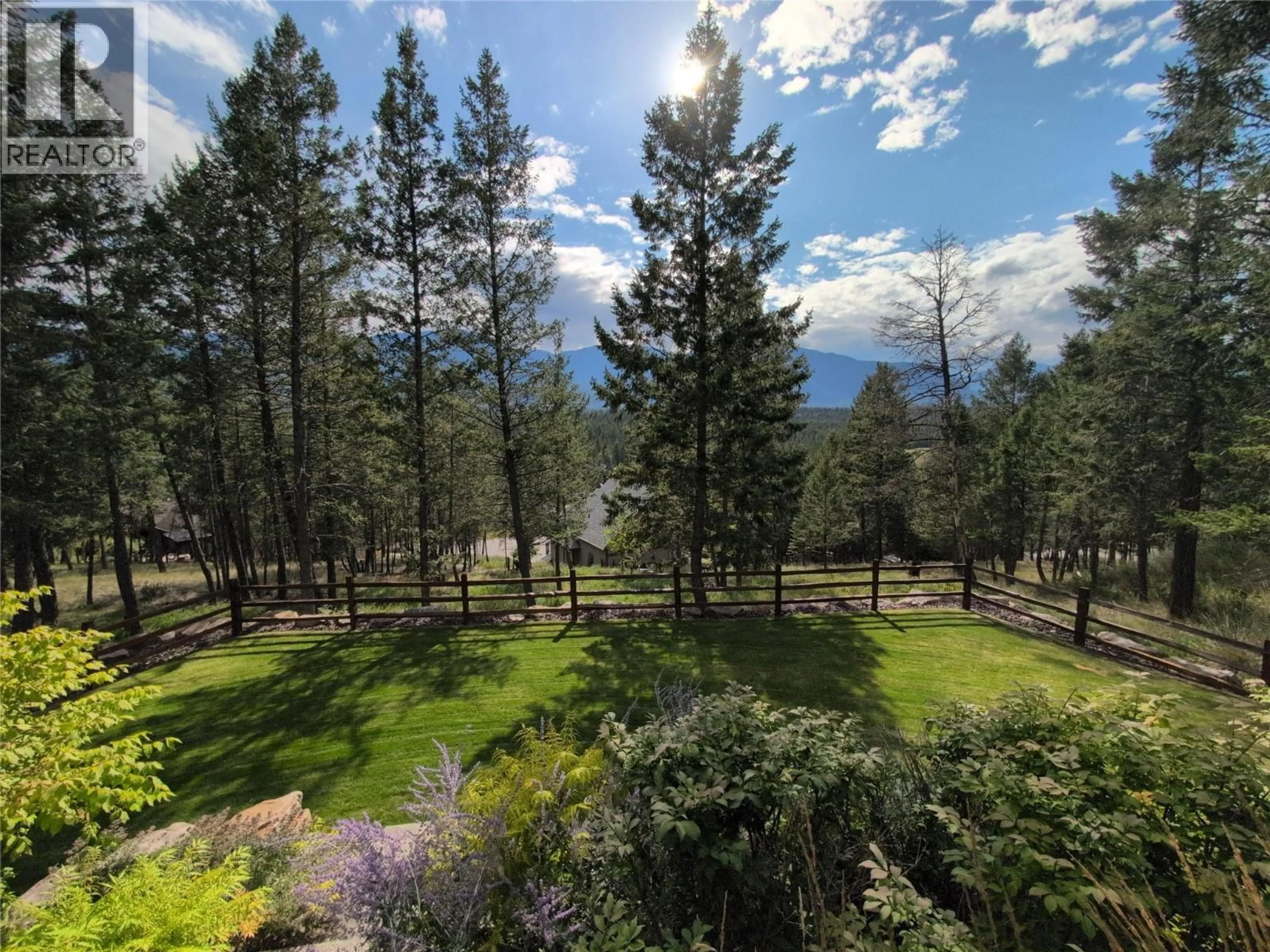 A pic from outside/outdoor area/front of a property/back of a property/a pic from drone, forest/trees view for 2550 LEDGEROCK RIDGE, Invermere British Columbia V0A1K6