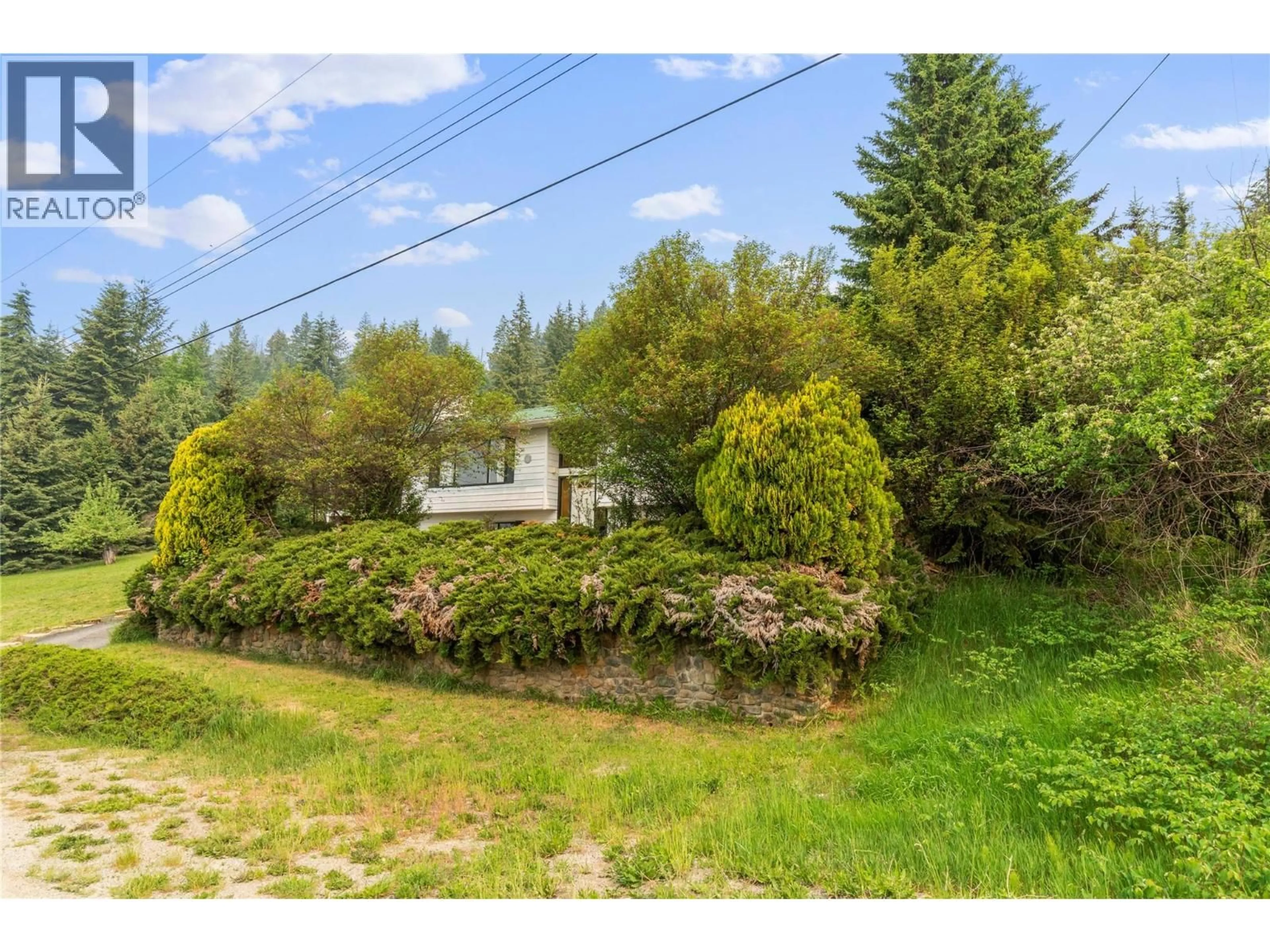 A pic from outside/outdoor area/front of a property/back of a property/a pic from drone, unknown for 5271 CHASEY ROAD, Celista British Columbia V0E1M6