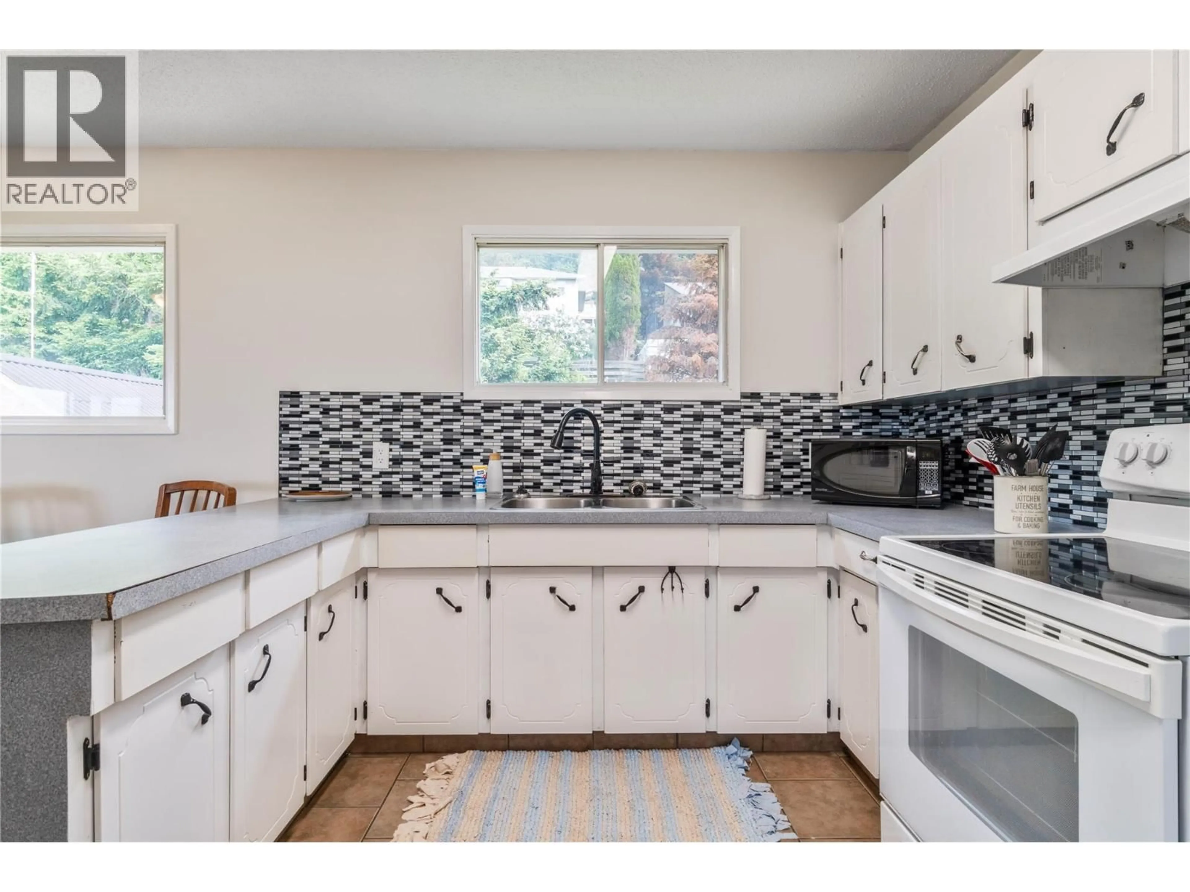 Standard kitchen, ceramic/tile floor for 5271 CHASEY ROAD, Celista British Columbia V0E1M6