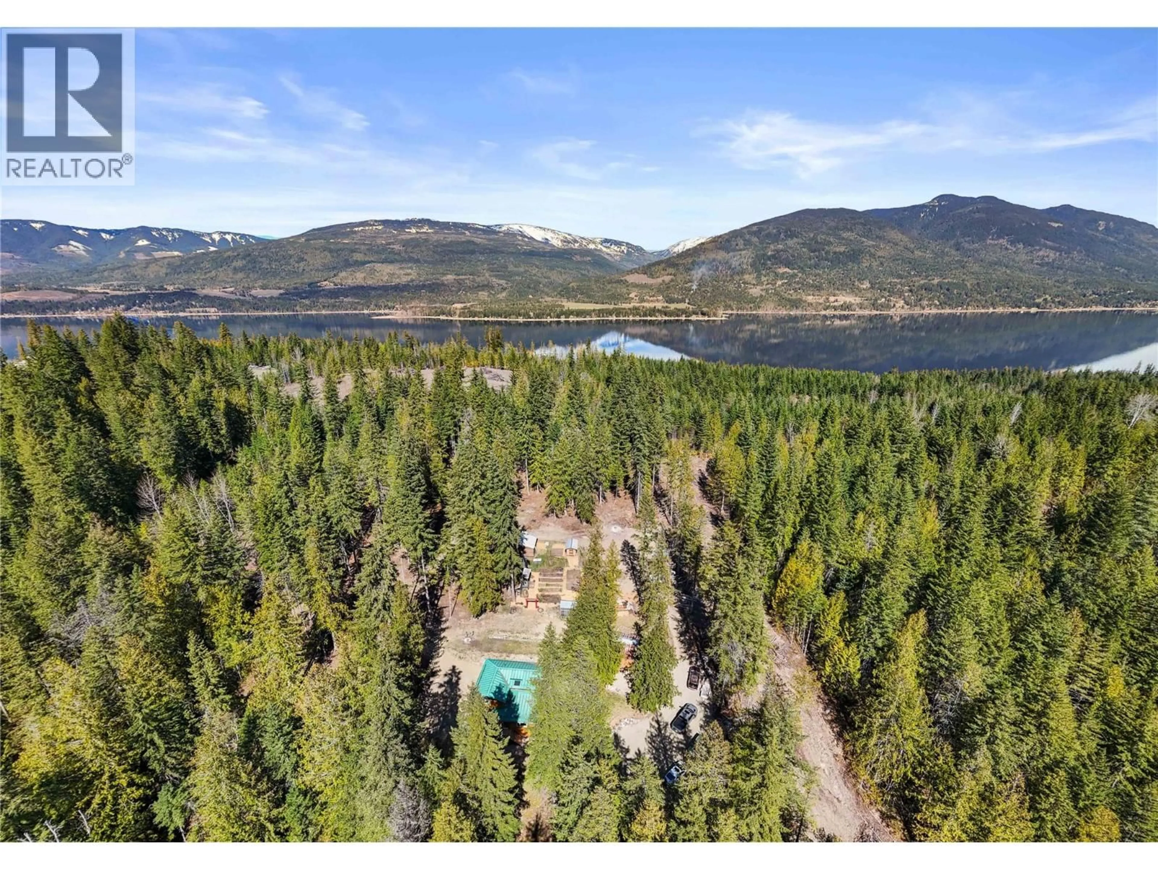 A pic from outside/outdoor area/front of a property/back of a property/a pic from drone, water/lake/river/ocean view for 4090 CAMILLE ROAD, Eagle Bay British Columbia V0E1T0