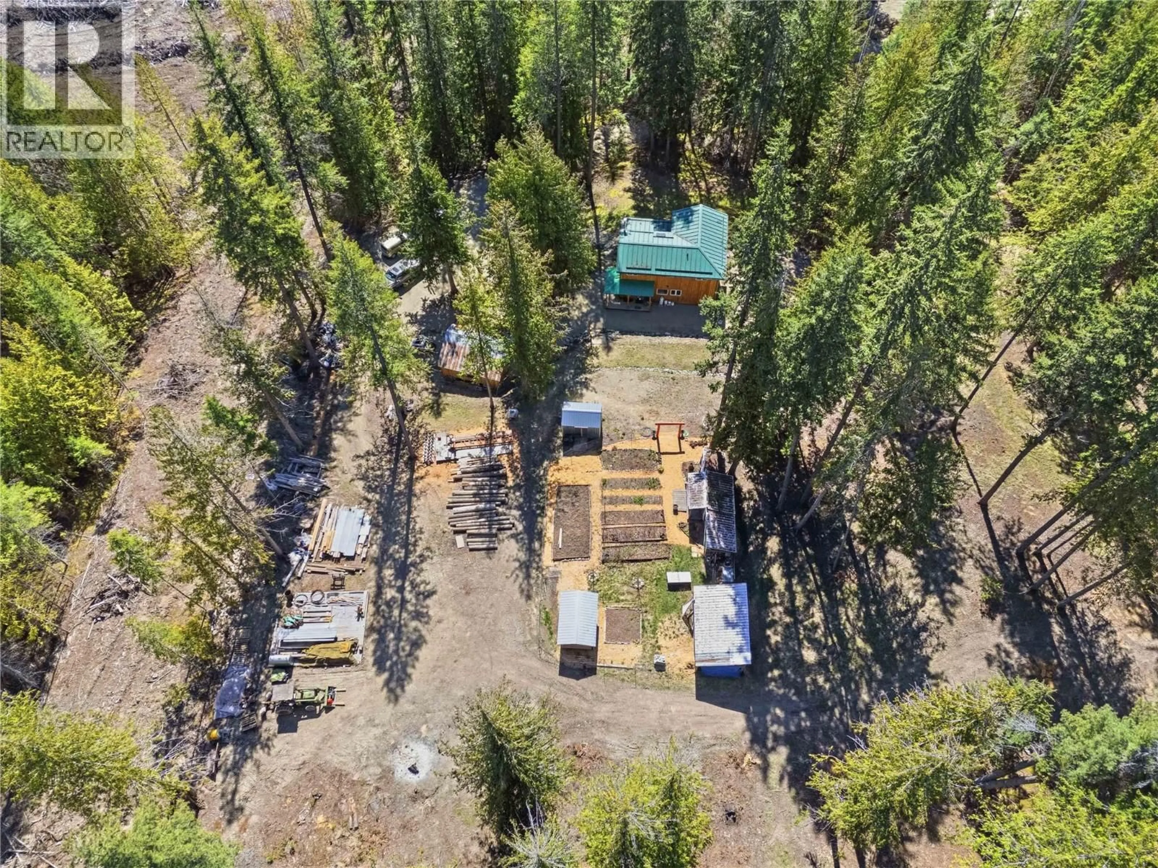 A pic from outside/outdoor area/front of a property/back of a property/a pic from drone, forest/trees view for 4090 CAMILLE ROAD, Eagle Bay British Columbia V0E1T0