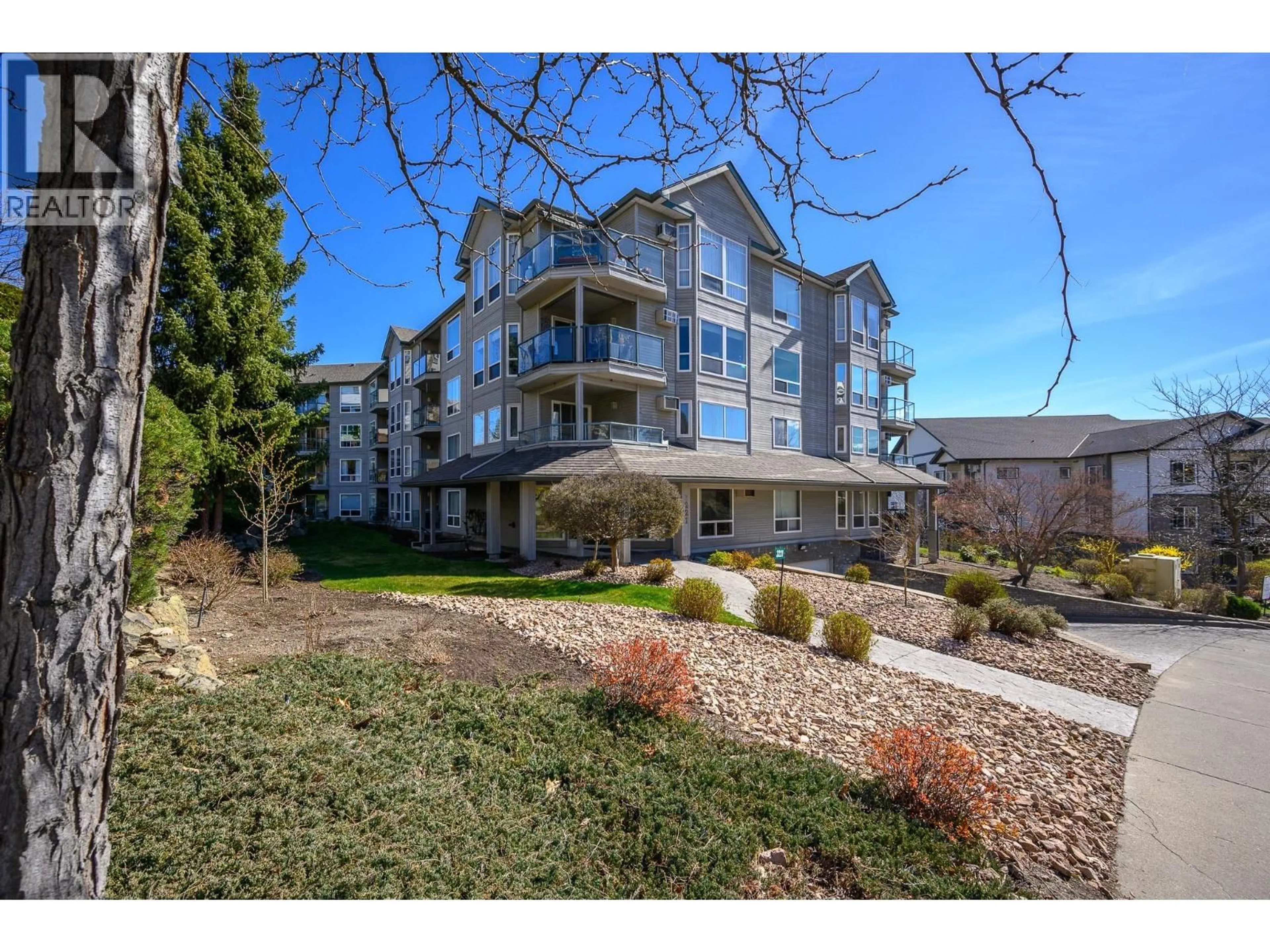 A pic from outside/outdoor area/front of a property/back of a property/a pic from drone, water/lake/river/ocean view for 402 - 3221 CENTENNIAL DRIVE, Vernon British Columbia V1T2T8