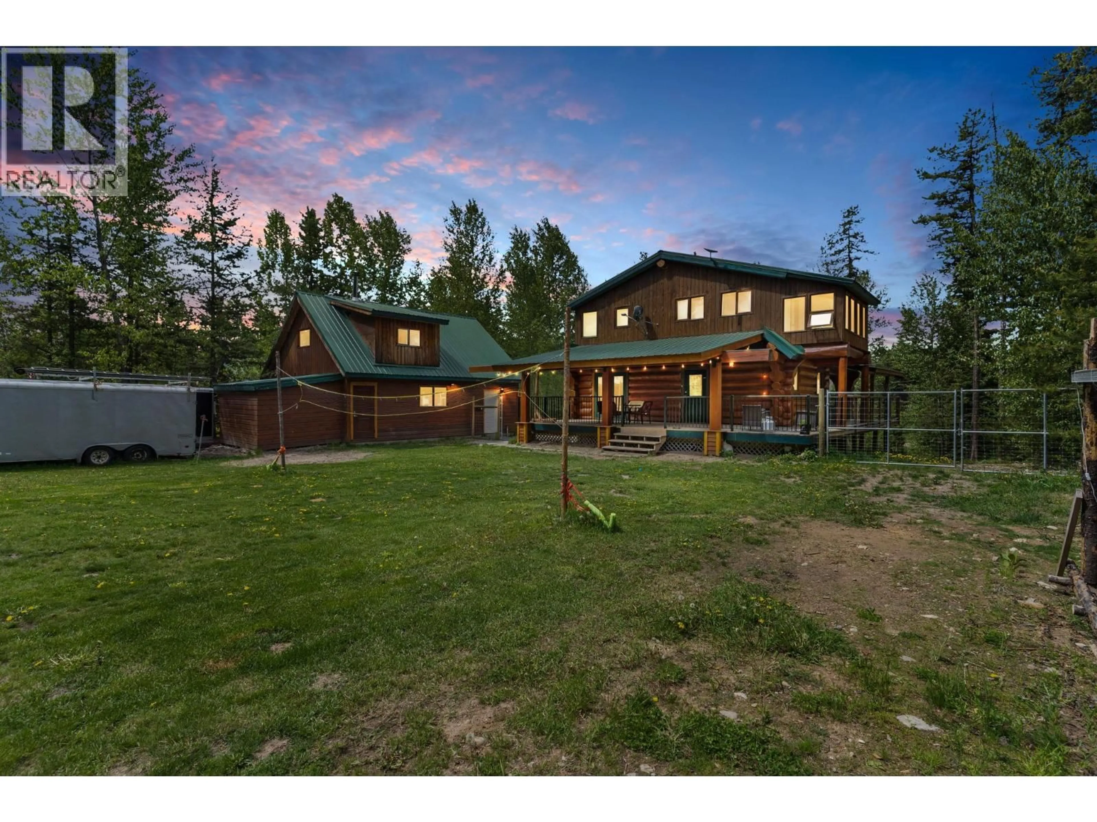 A pic from outside/outdoor area/front of a property/back of a property/a pic from drone, mountain view for 9360 SUNRISE PLACE, Idabel Lake British Columbia V1P1P4