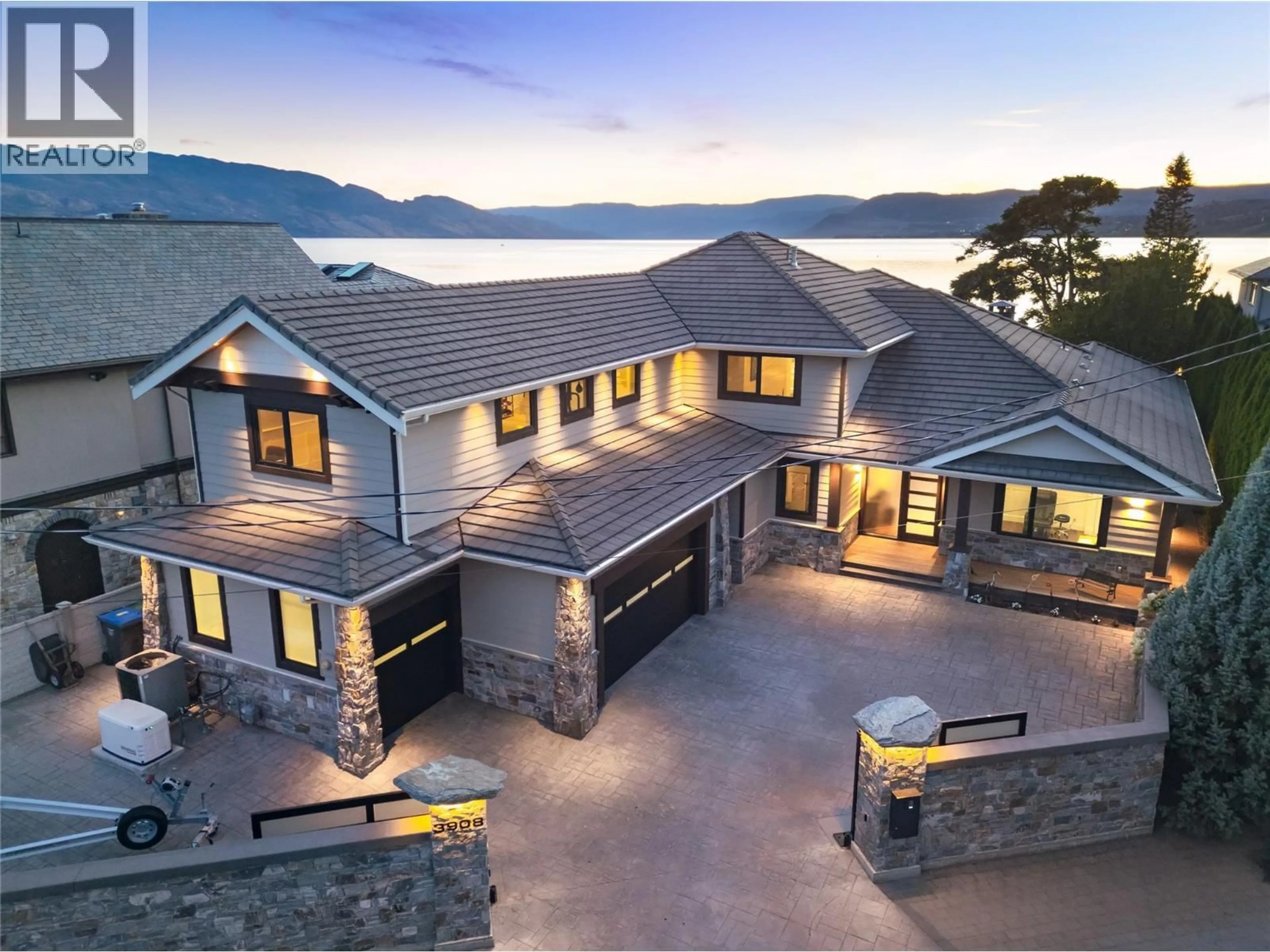 A pic from outside/outdoor area/front of a property/back of a property/a pic from drone, water/lake/river/ocean view for 3908 BLUEBIRD ROAD, Kelowna British Columbia V1W1X6
