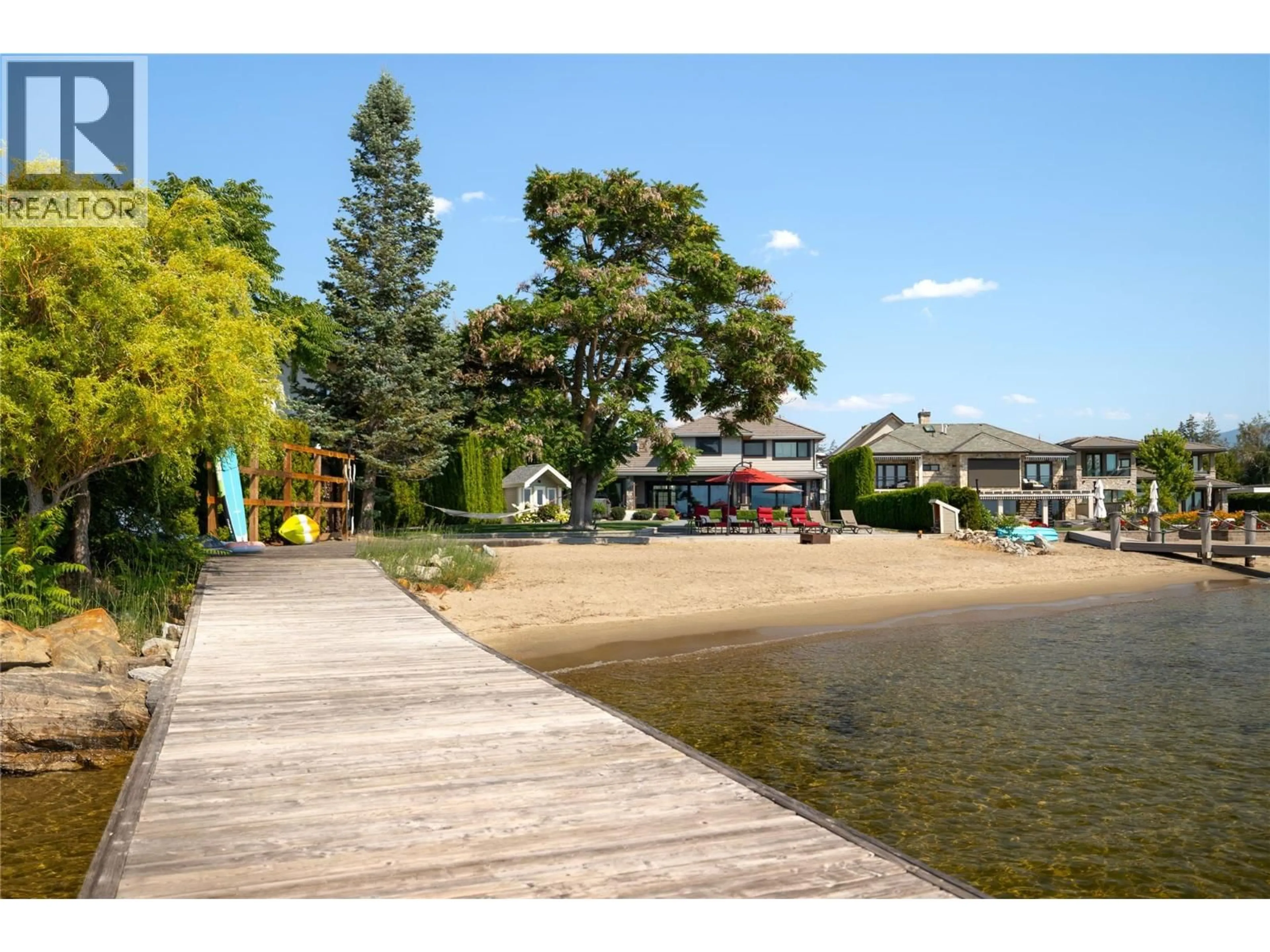 A pic from outside/outdoor area/front of a property/back of a property/a pic from drone, water/lake/river/ocean view for 3908 BLUEBIRD ROAD, Kelowna British Columbia V1W1X6