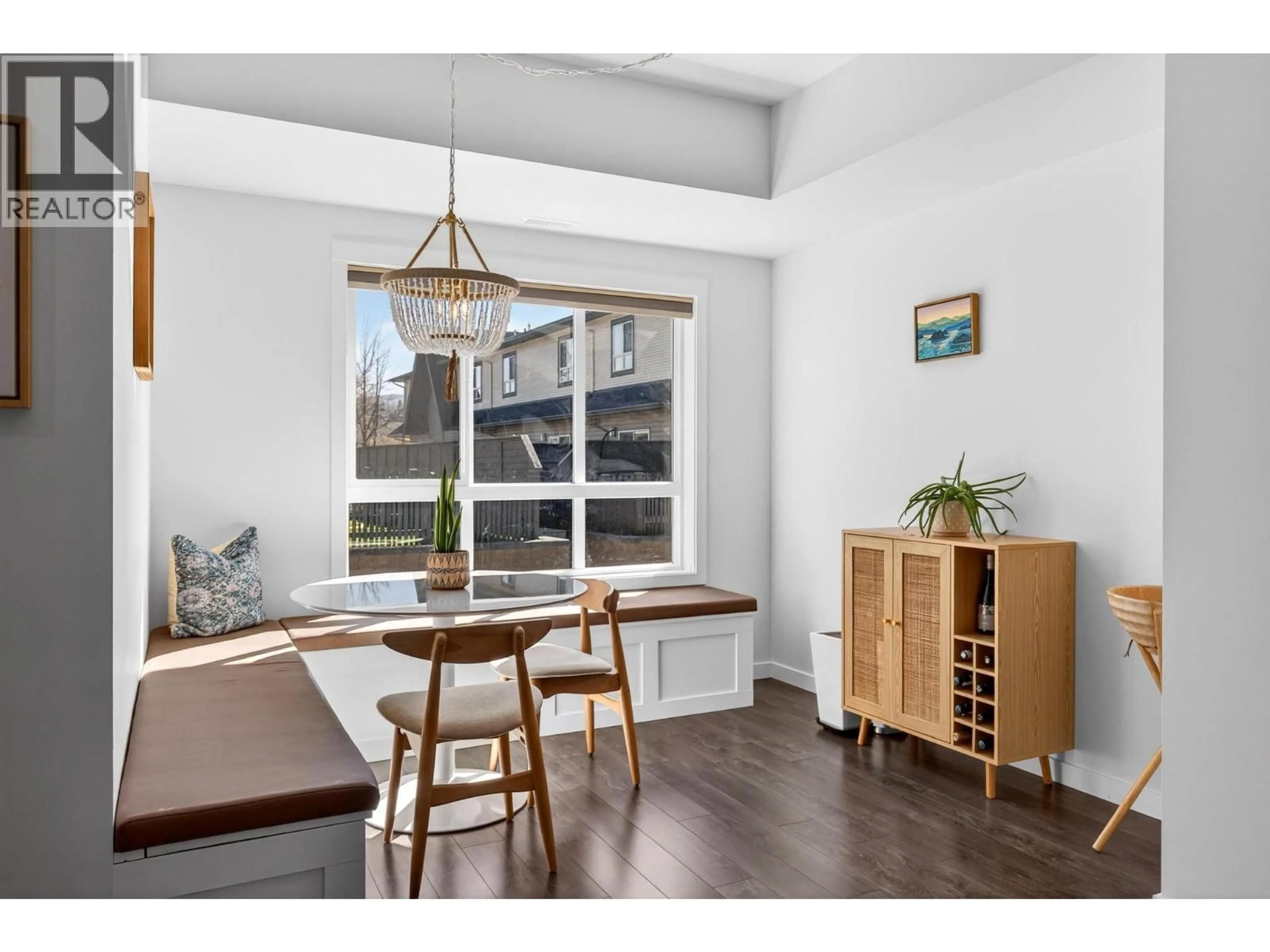 Dining room, wood/laminate floor for 33 - 680 OLD MEADOWS ROAD, Kelowna British Columbia V1W5L4
