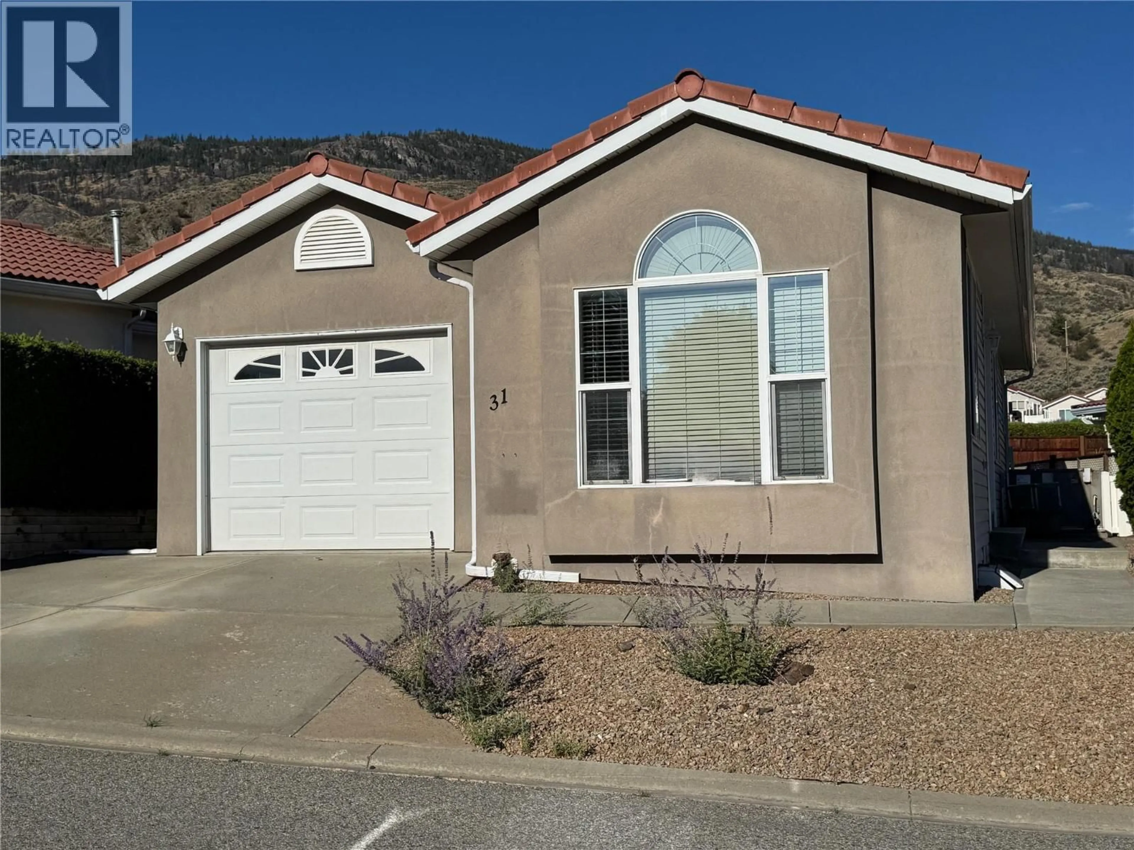 Home with vinyl exterior material, street for 31 - 9400 115TH STREET, Osoyoos British Columbia V0H1V3