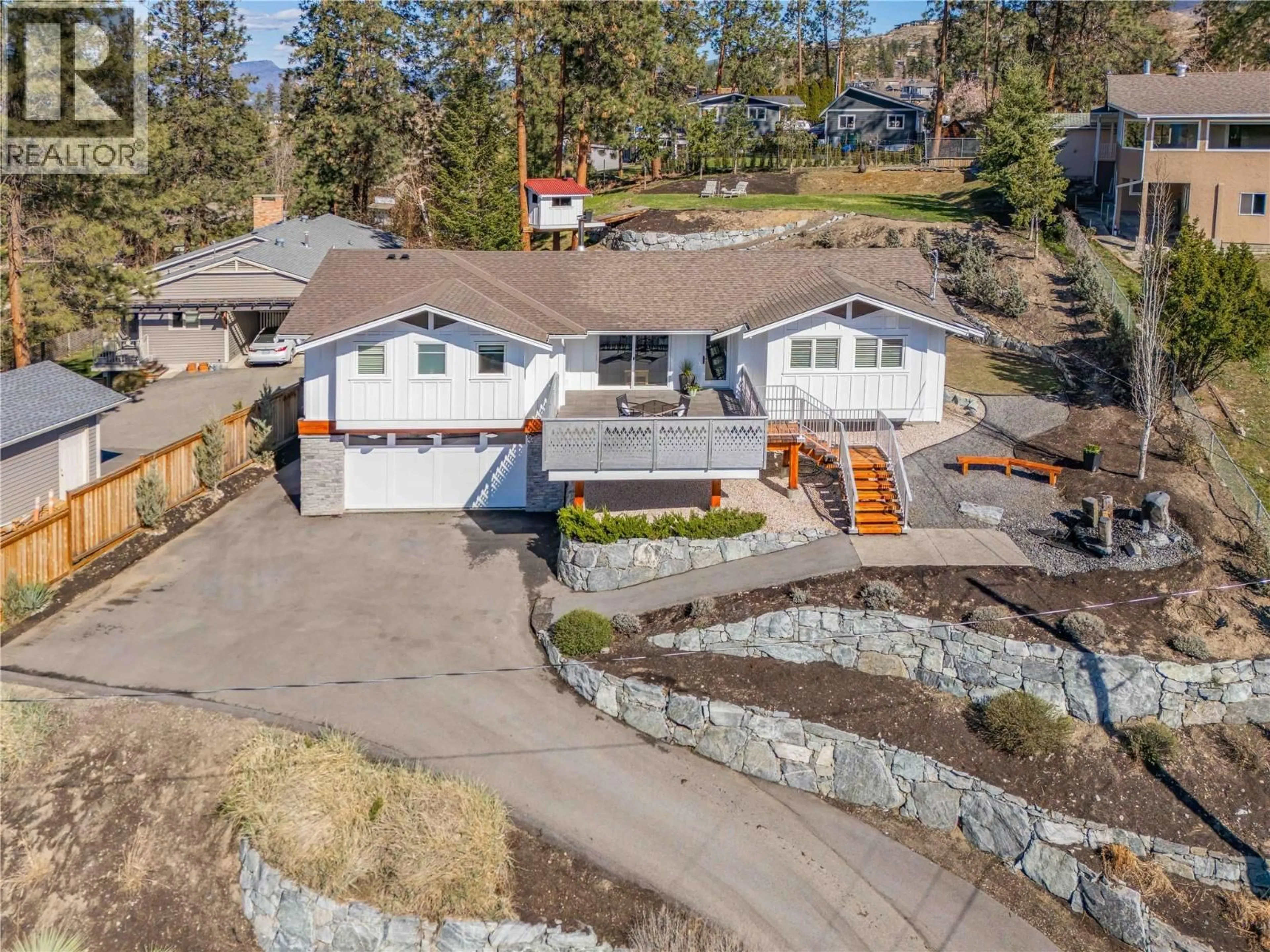 A pic from outside/outdoor area/front of a property/back of a property/a pic from drone, unknown for 488 SHEILA CRESCENT, Kelowna British Columbia V1W4L8