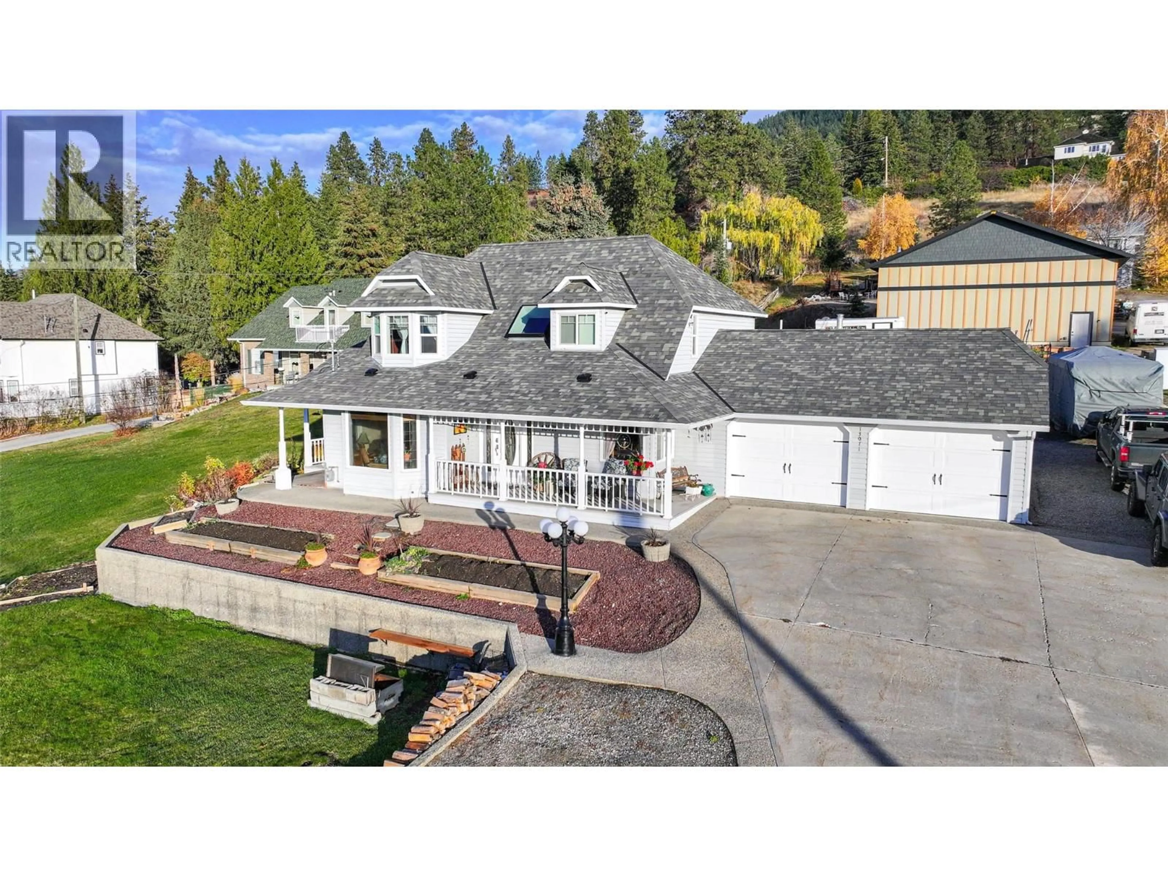 A pic from outside/outdoor area/front of a property/back of a property/a pic from drone, mountain view for 13071 TREWHITT ROAD EAST, Lake Country British Columbia V4V2B1