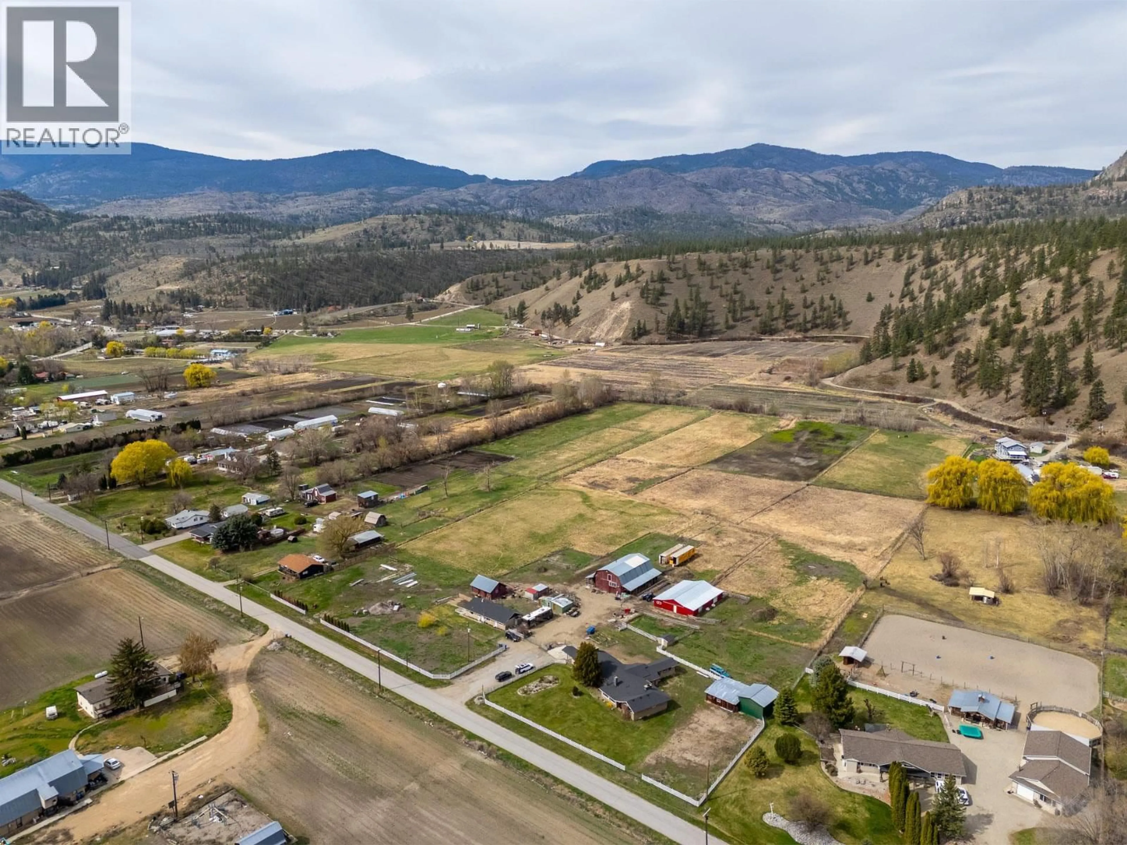 A pic from outside/outdoor area/front of a property/back of a property/a pic from drone, mountain view for 8134 RIVER ROAD, Oliver British Columbia V0H1T7