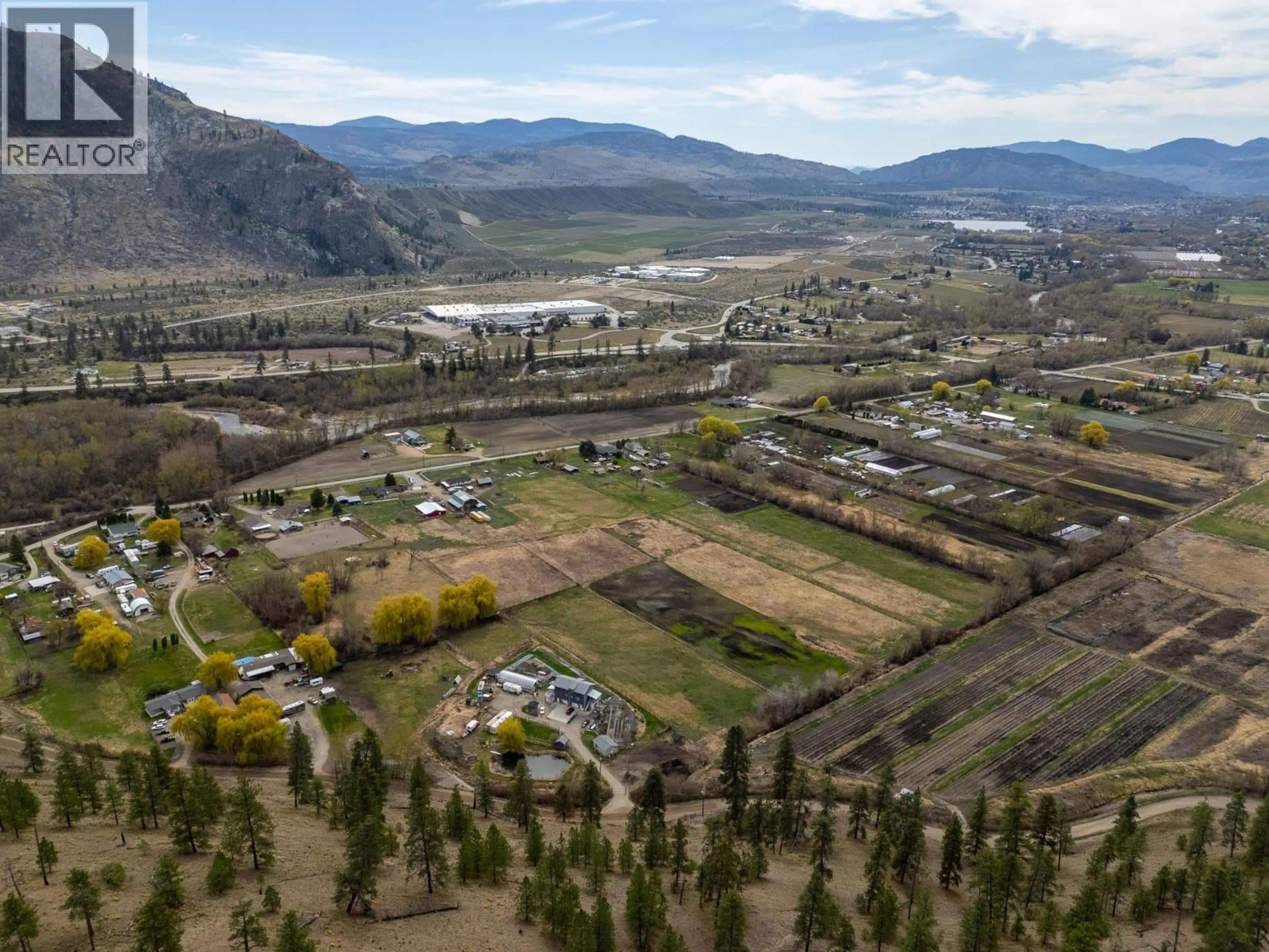 A pic from outside/outdoor area/front of a property/back of a property/a pic from drone, mountain view for 8134 RIVER ROAD, Oliver British Columbia V0H1T7