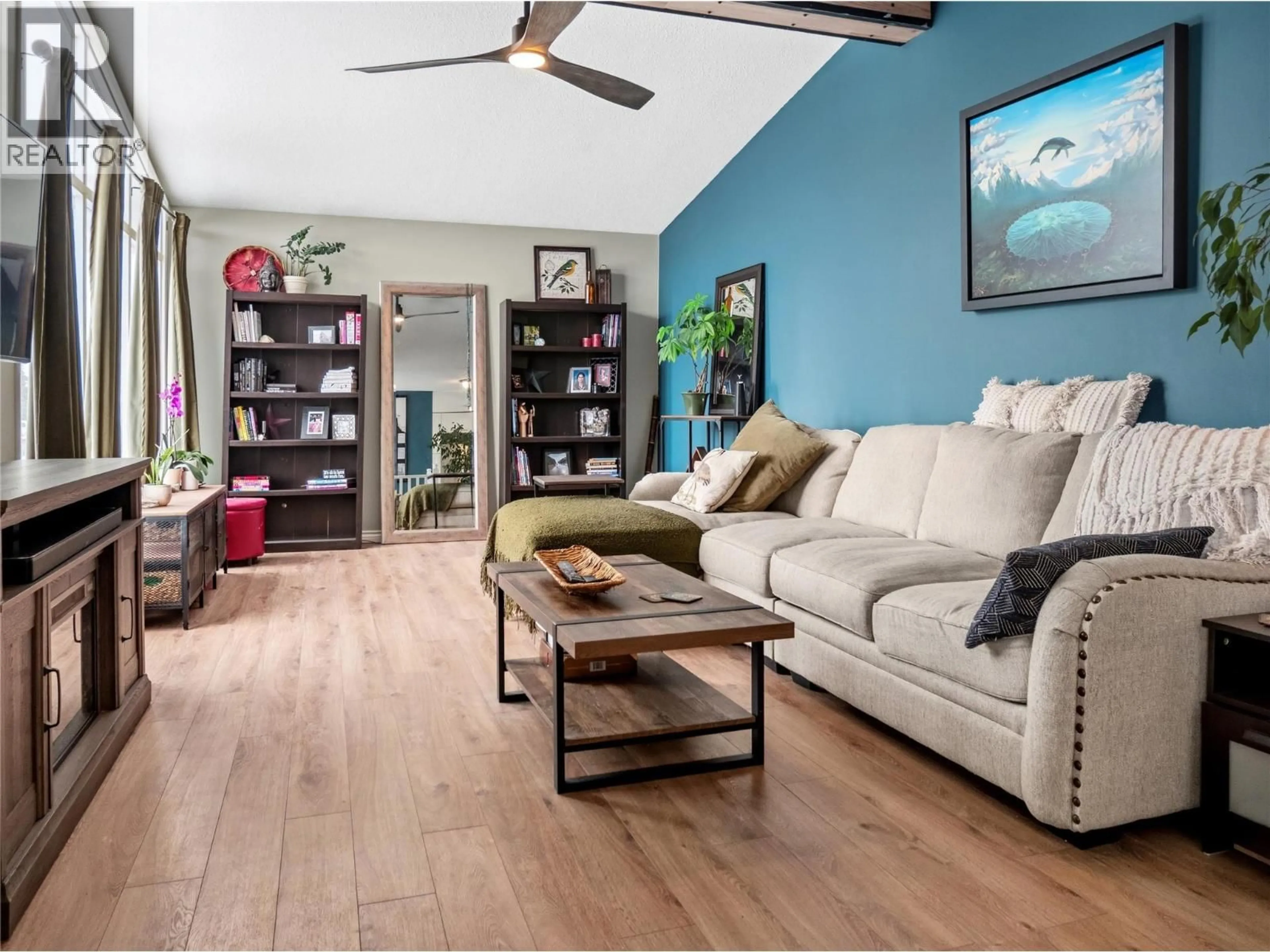 Living room with furniture, wood/laminate floor for 1841 ASPEN DRIVE, Dawson Creek British Columbia V1G2S5