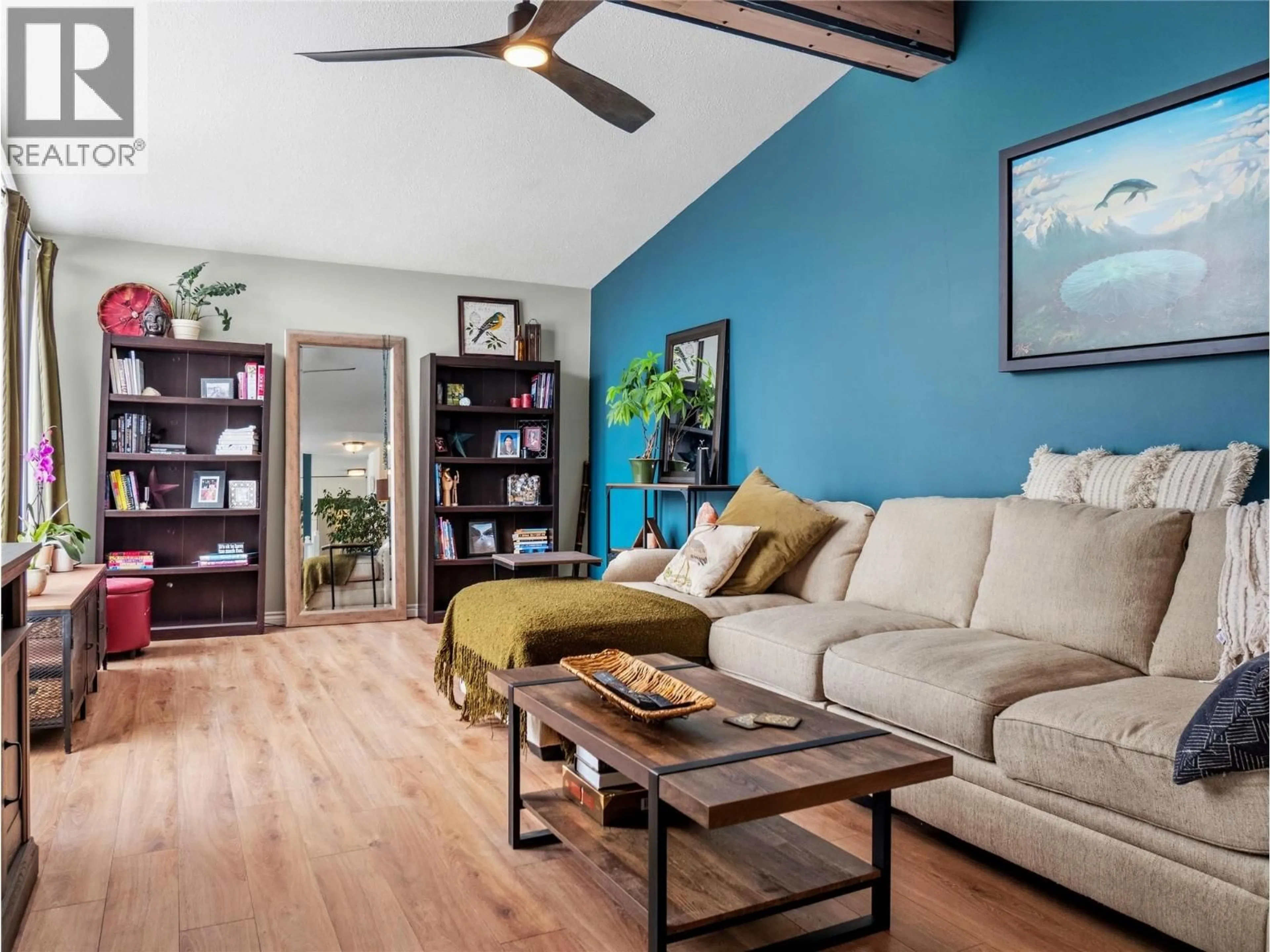 Living room with furniture, wood/laminate floor for 1841 ASPEN DRIVE, Dawson Creek British Columbia V1G2S5