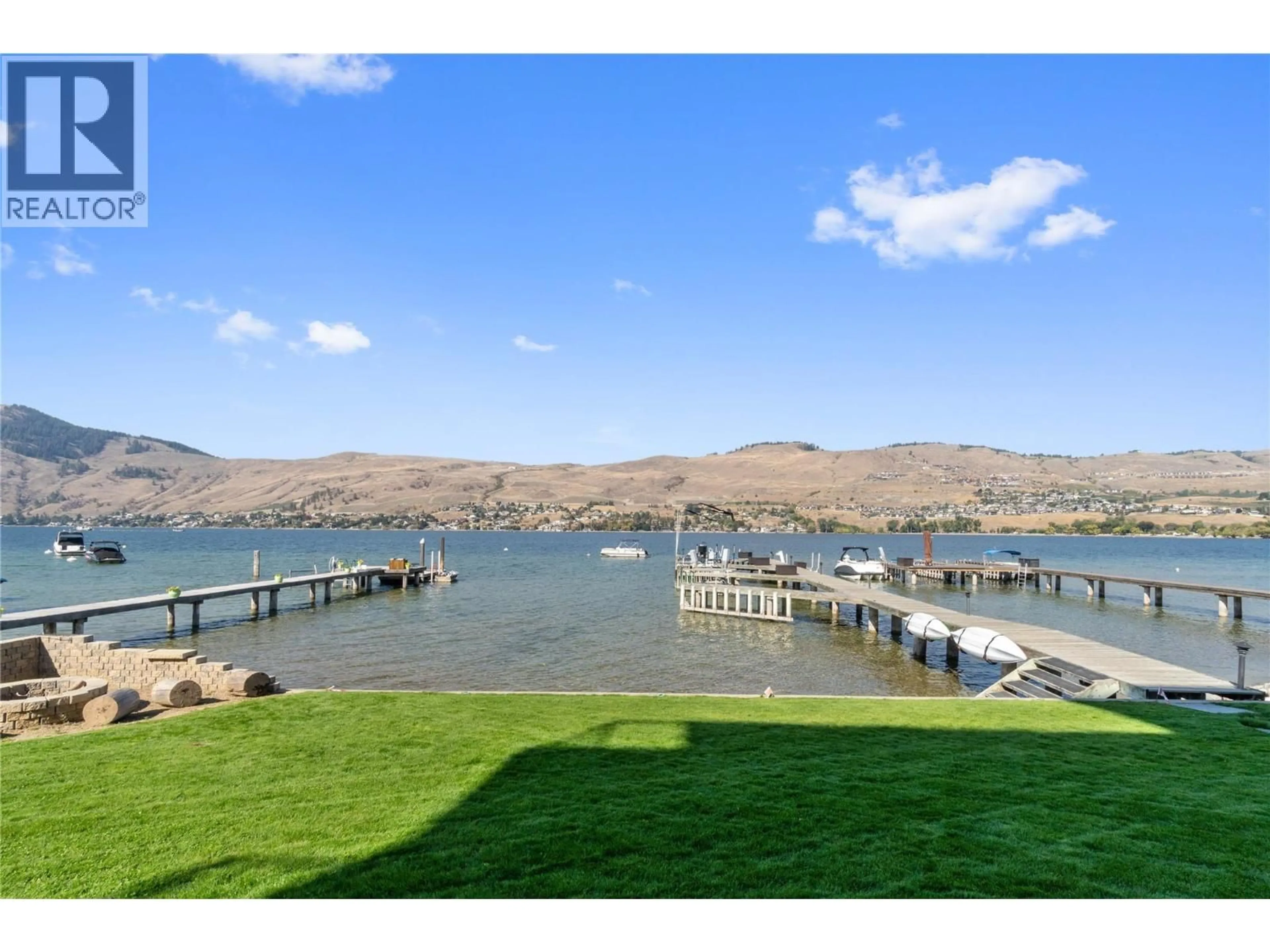 A pic from outside/outdoor area/front of a property/back of a property/a pic from drone, water/lake/river/ocean view for 102 - 7511 BROOKS LANE, Vernon British Columbia V1H2H9