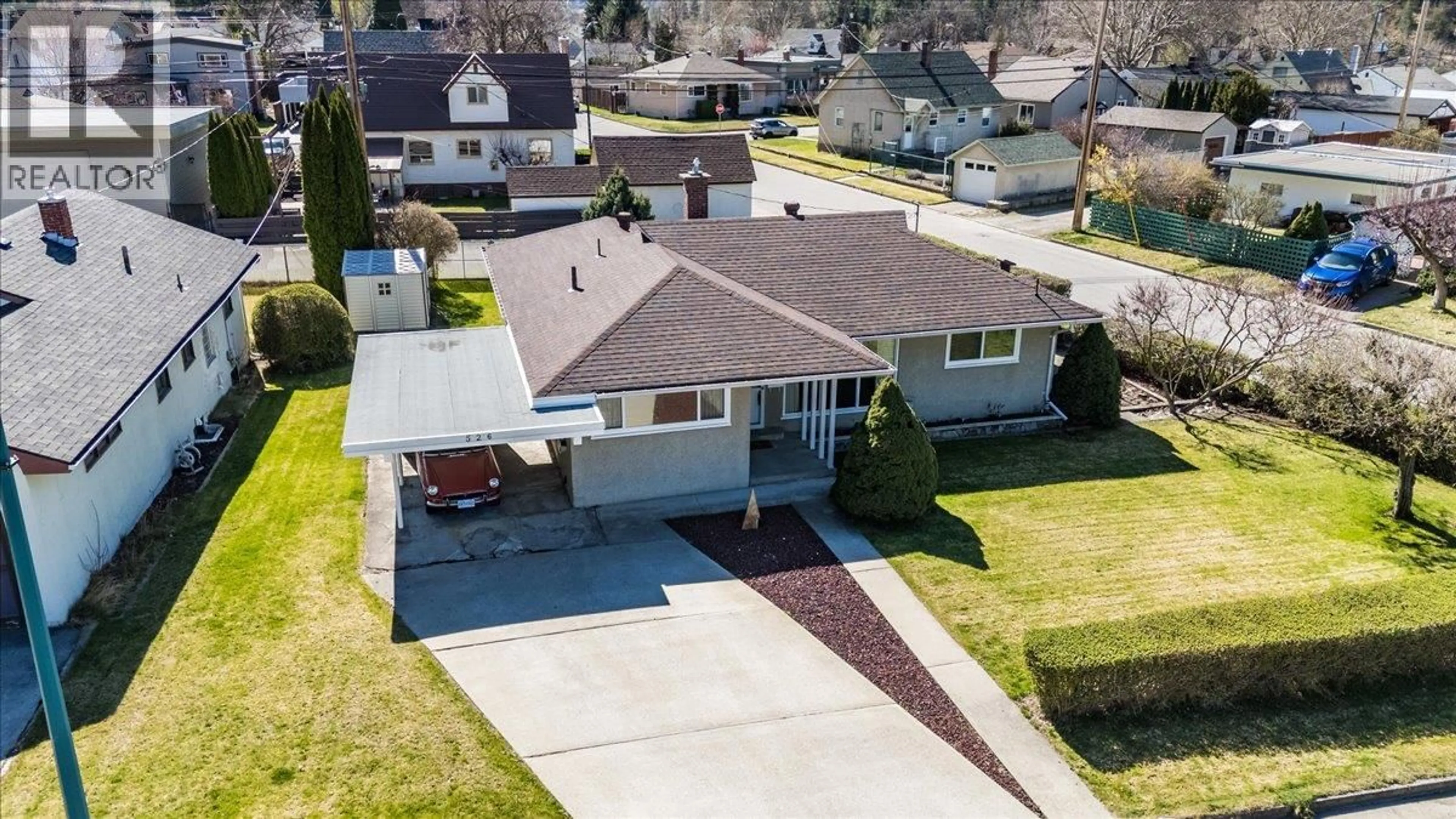 A pic from outside/outdoor area/front of a property/back of a property/a pic from drone, street for 526 PORTIA CRESCENT, Trail British Columbia V1R1A9