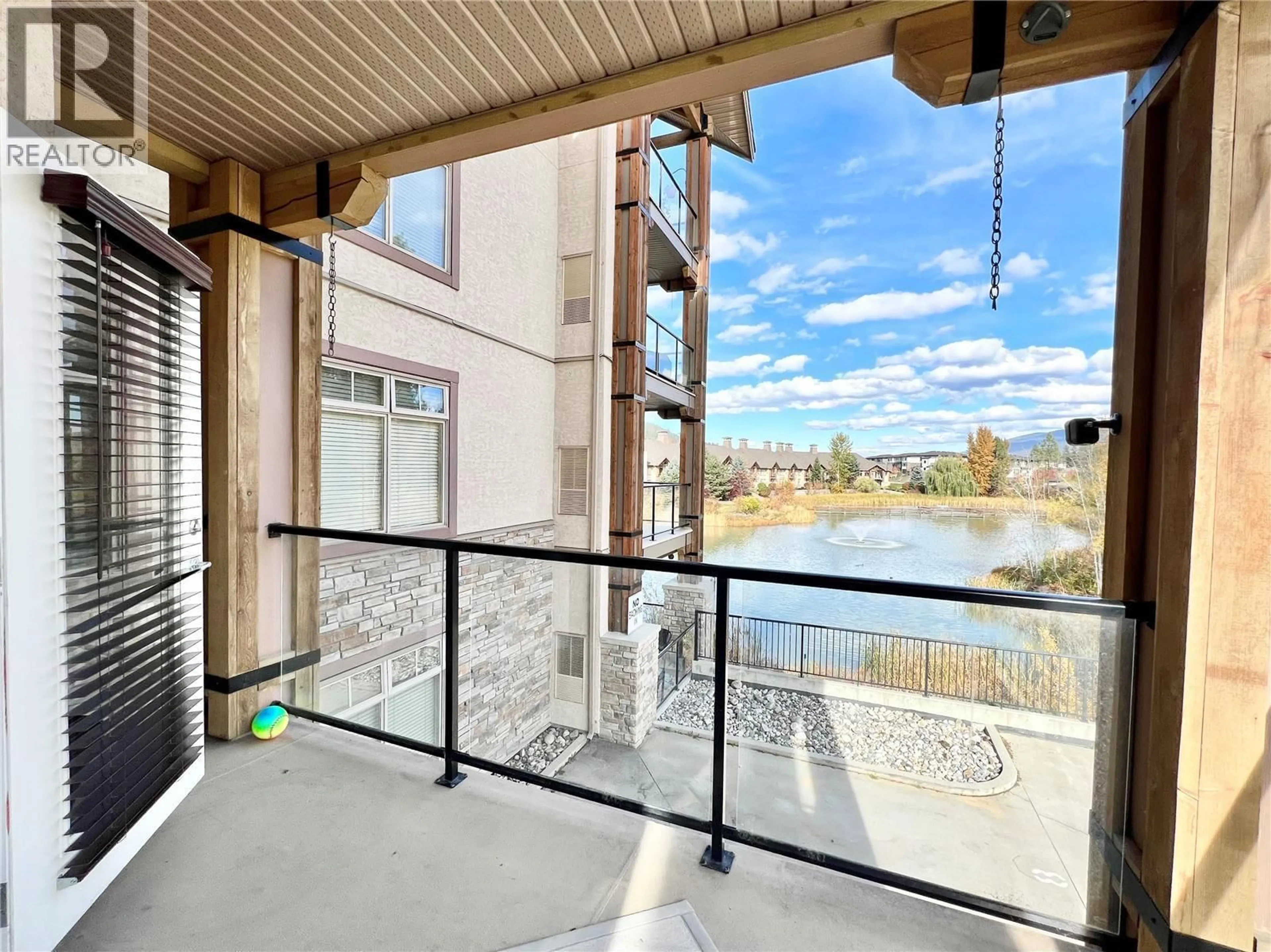 Balcony in the apartment, water/lake/river/ocean view for 223 - 2551 SHORELINE DRIVE, Lake Country British Columbia V4V2P2