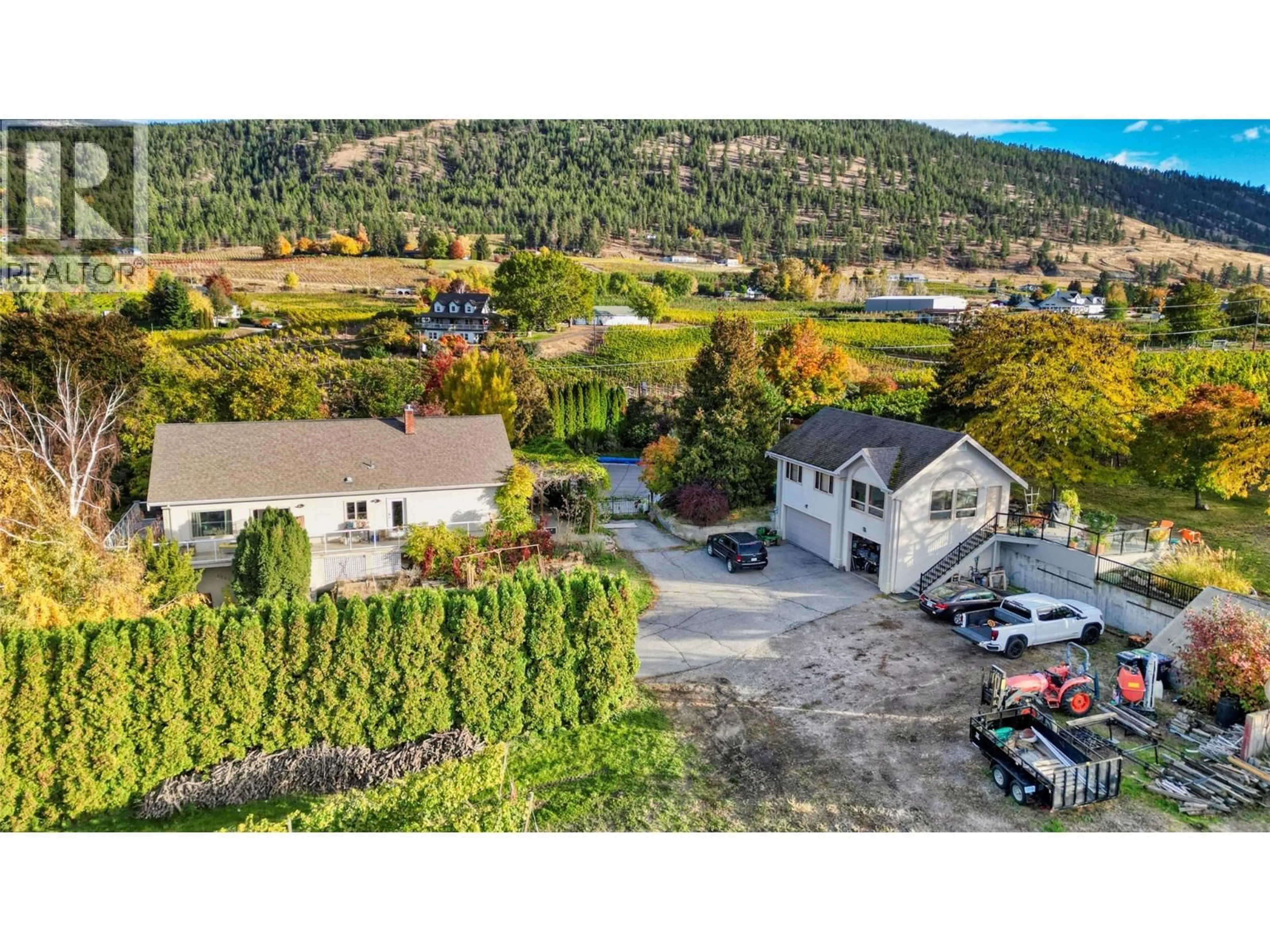 A pic from outside/outdoor area/front of a property/back of a property/a pic from drone, mountain view for 1282 CORBISHLEY AVENUE, Penticton British Columbia V2A8V2
