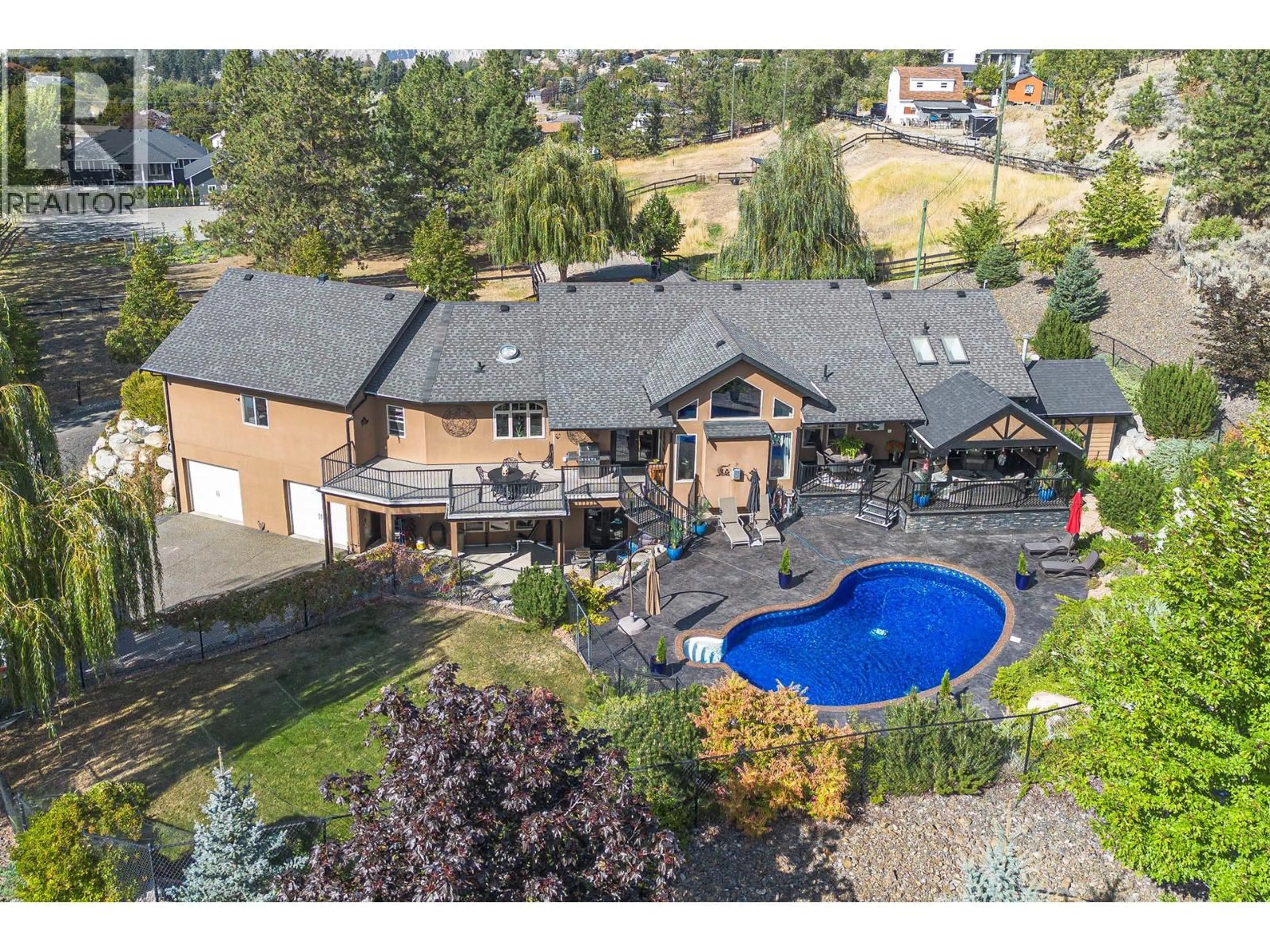 A pic from outside/outdoor area/front of a property/back of a property/a pic from drone, mountain view for 5833 TODD ROAD, Kamloops British Columbia V2C6P2