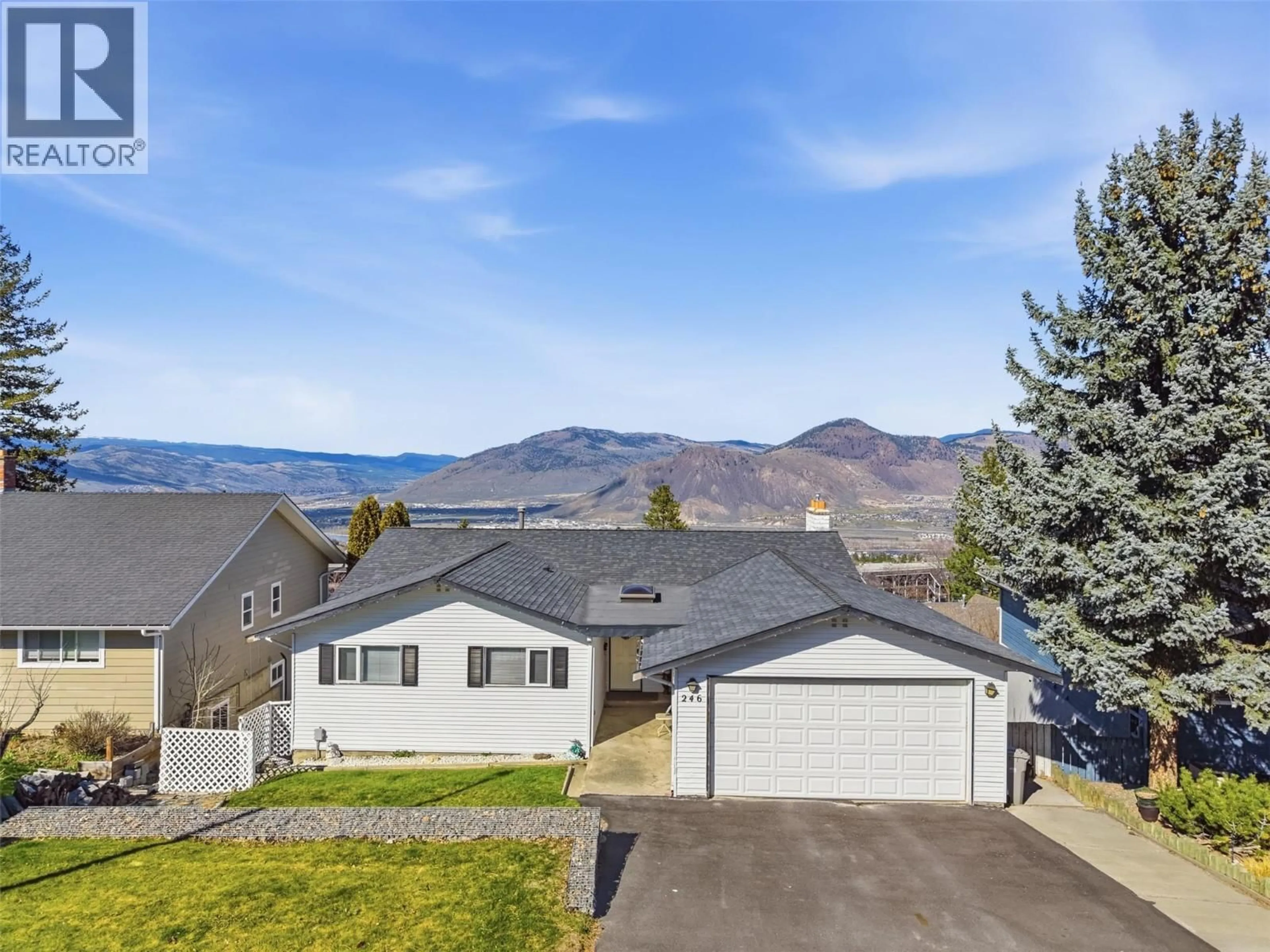 A pic from outside/outdoor area/front of a property/back of a property/a pic from drone, mountain view for 246 ROBSON DRIVE, Kamloops British Columbia V2E1W1