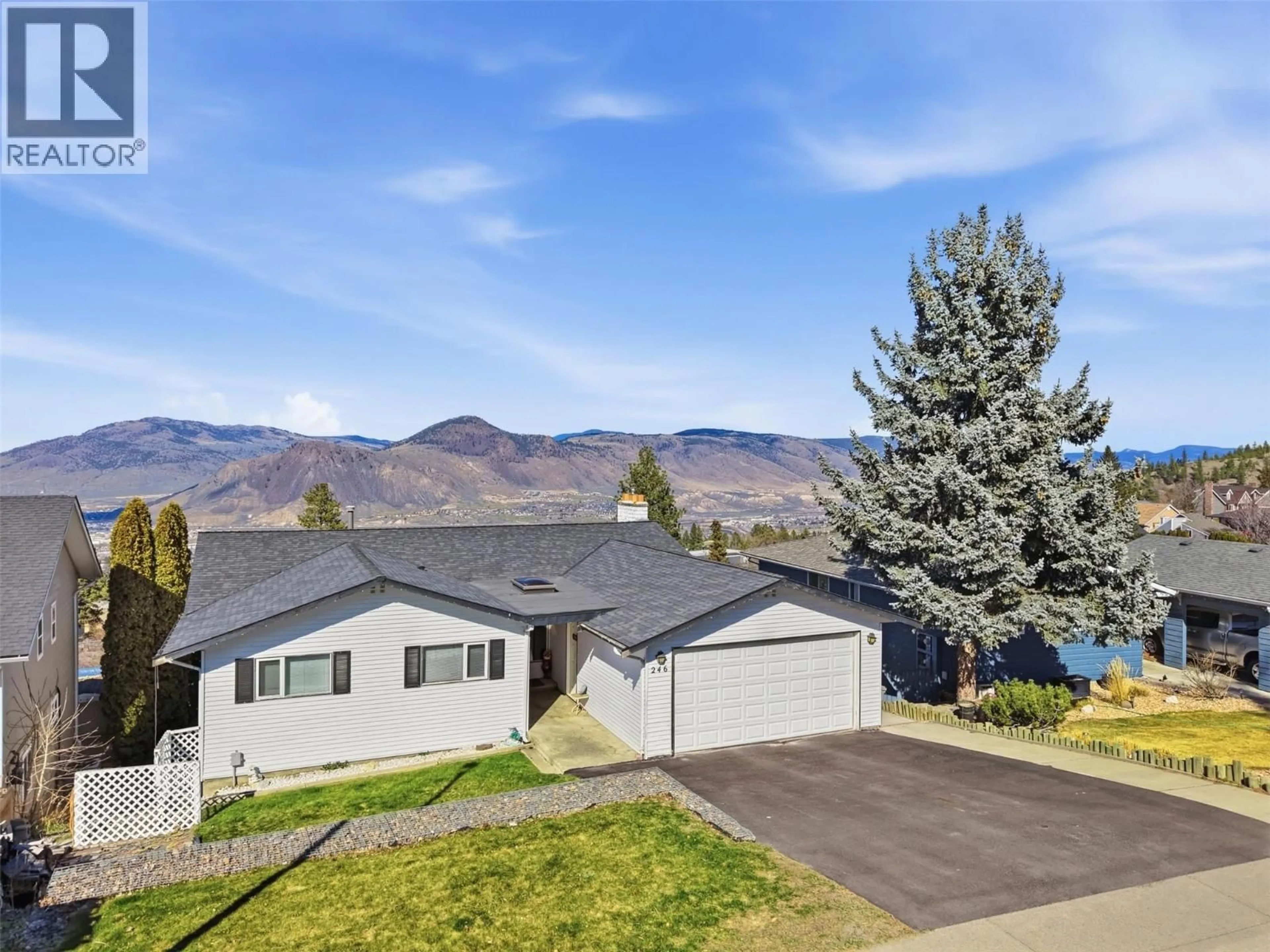 A pic from outside/outdoor area/front of a property/back of a property/a pic from drone, mountain view for 246 ROBSON DRIVE, Kamloops British Columbia V2E1W1