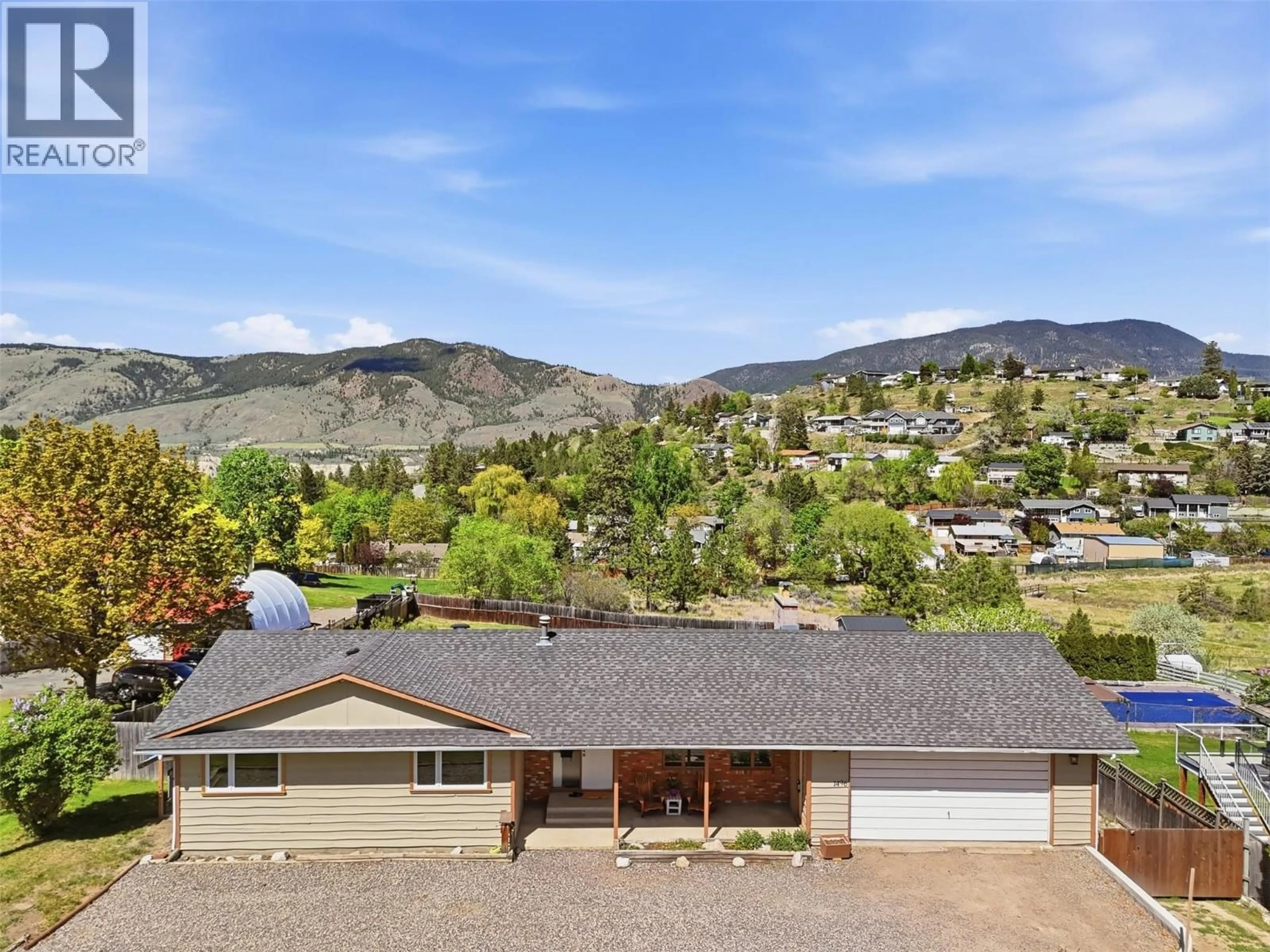 A pic from outside/outdoor area/front of a property/back of a property/a pic from drone, mountain view for 1496 TODD ROAD, Kamloops British Columbia V2C5B5