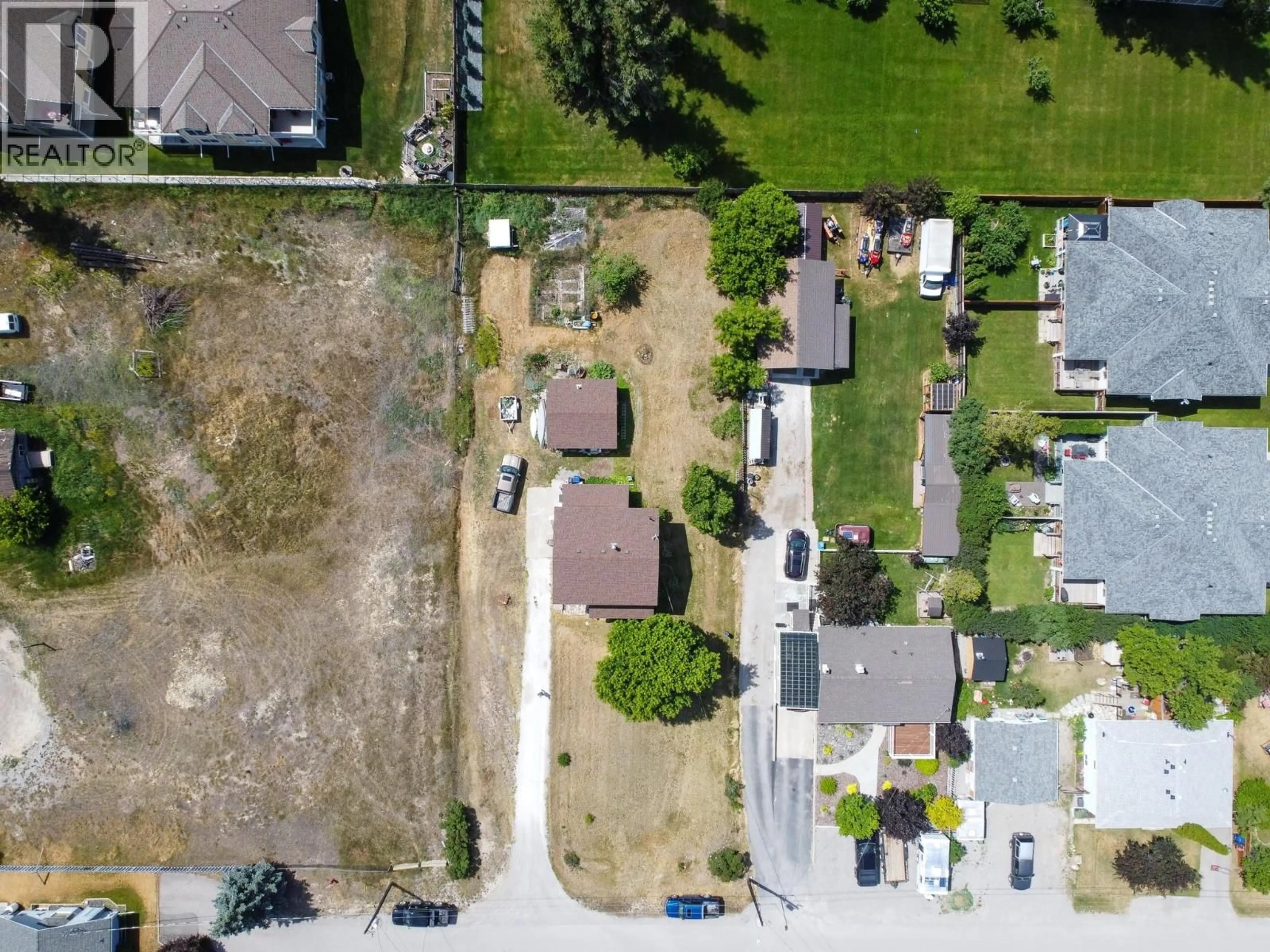 A pic from outside/outdoor area/front of a property/back of a property/a pic from drone, street for 1012 11 AVENUE, Invermere British Columbia V0A1K4