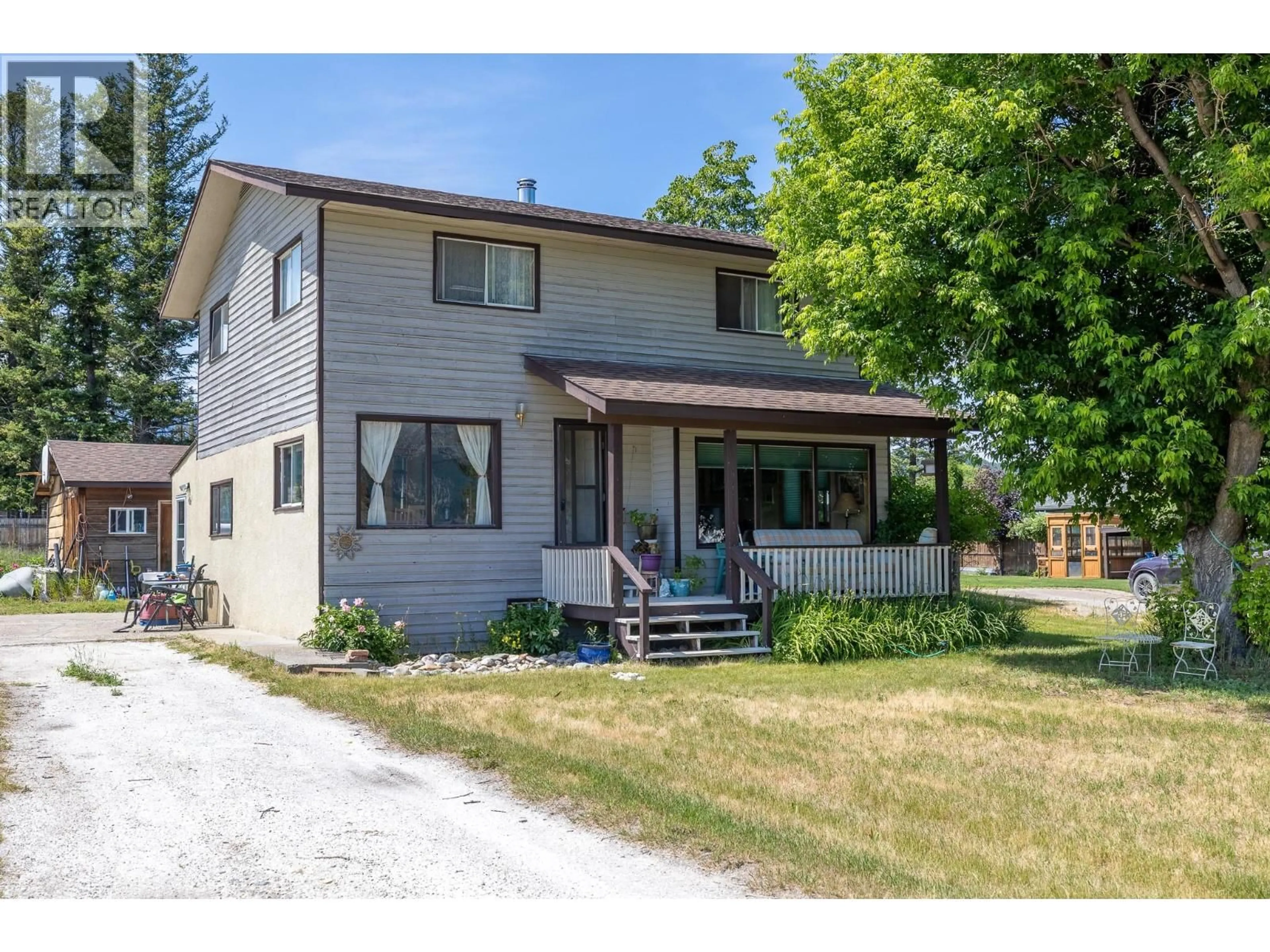 Home with vinyl exterior material, street for 1012 11 AVENUE, Invermere British Columbia V0A1K4