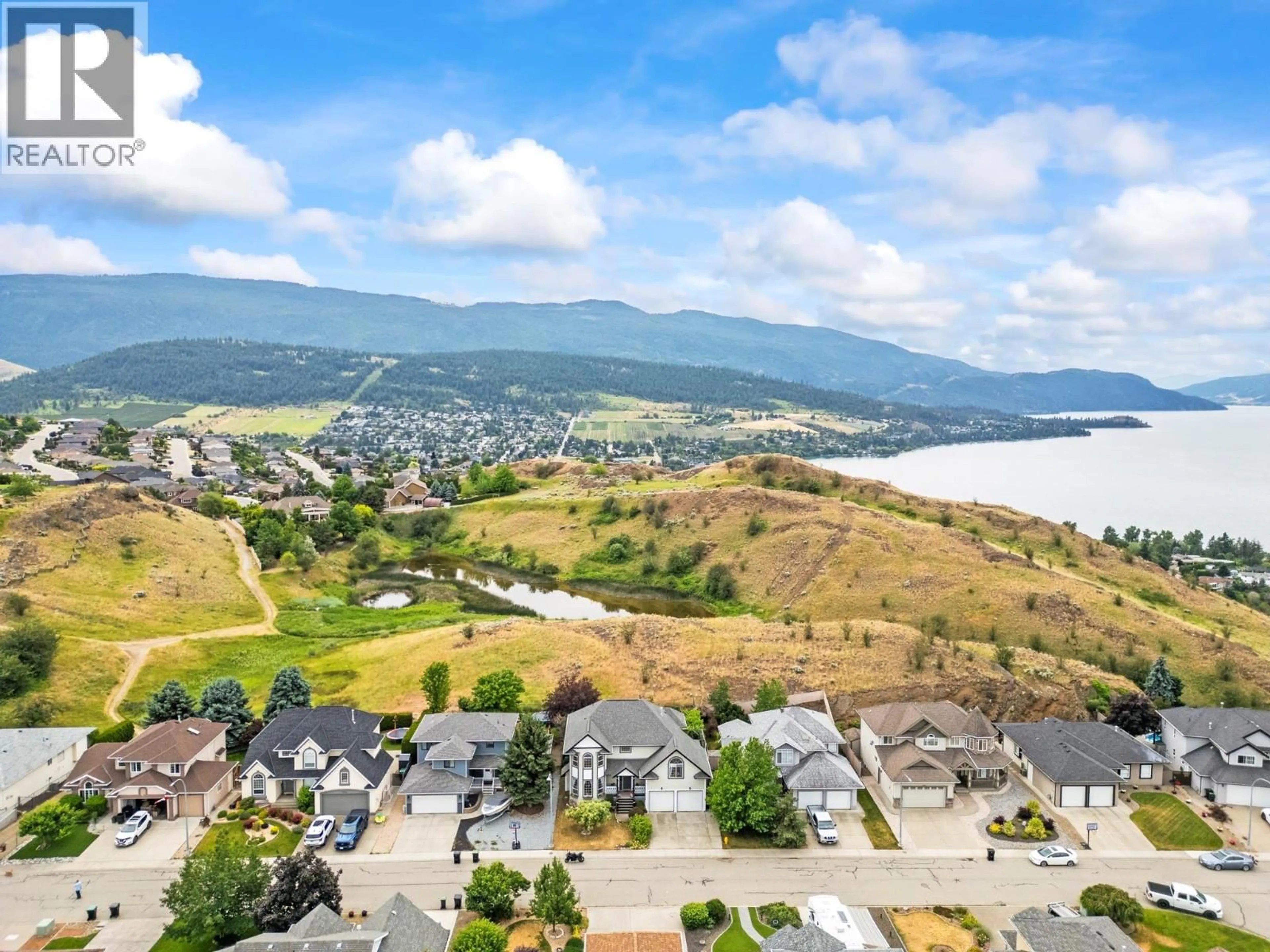 A pic from outside/outdoor area/front of a property/back of a property/a pic from drone, water/lake/river/ocean view for 859 MT. BULMAN PLACE, Vernon British Columbia V1B2Z3