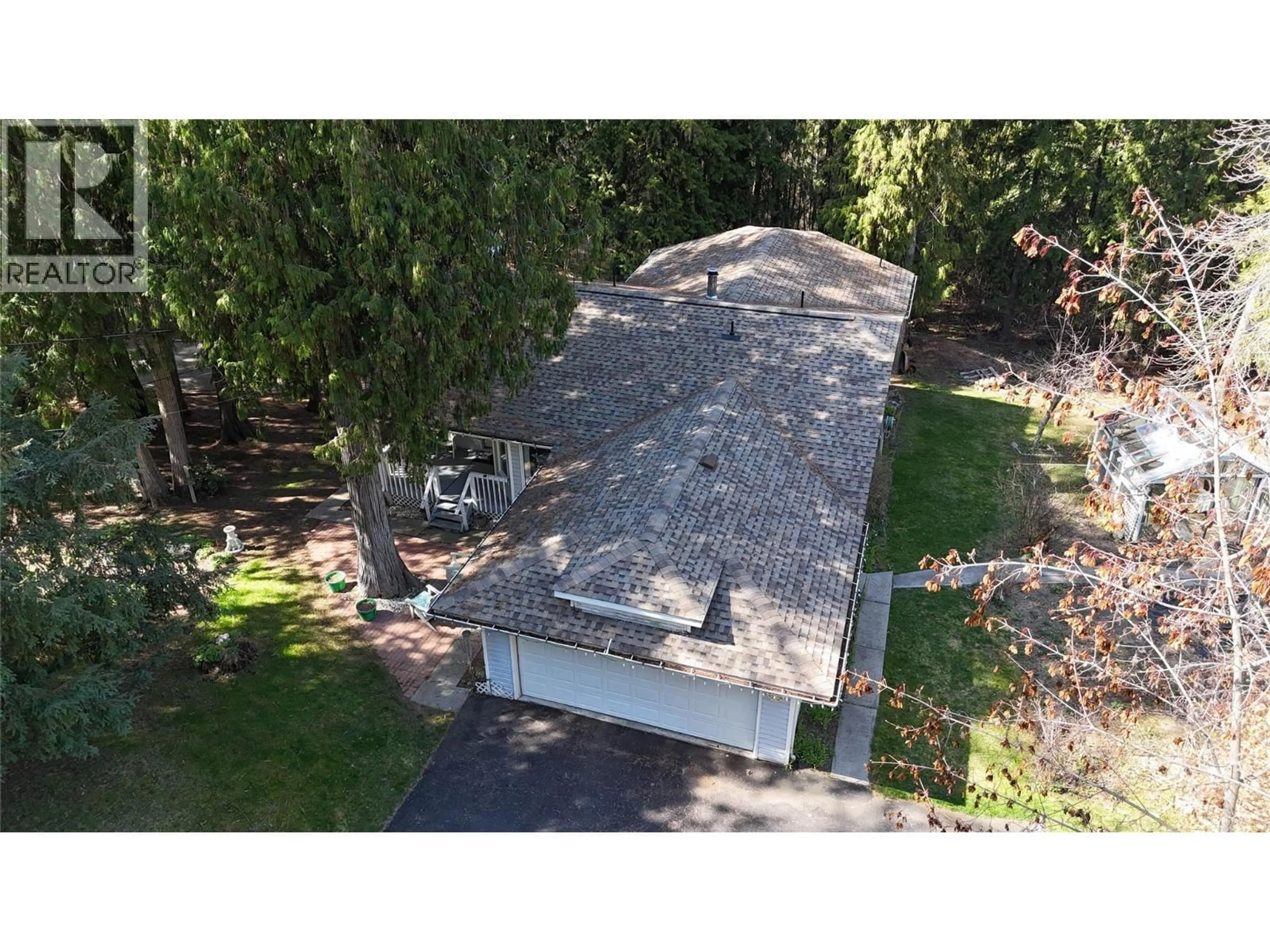 A pic from outside/outdoor area/front of a property/back of a property/a pic from drone, street for 3150 HAMA ROAD, Christina Lake British Columbia V0H1E0