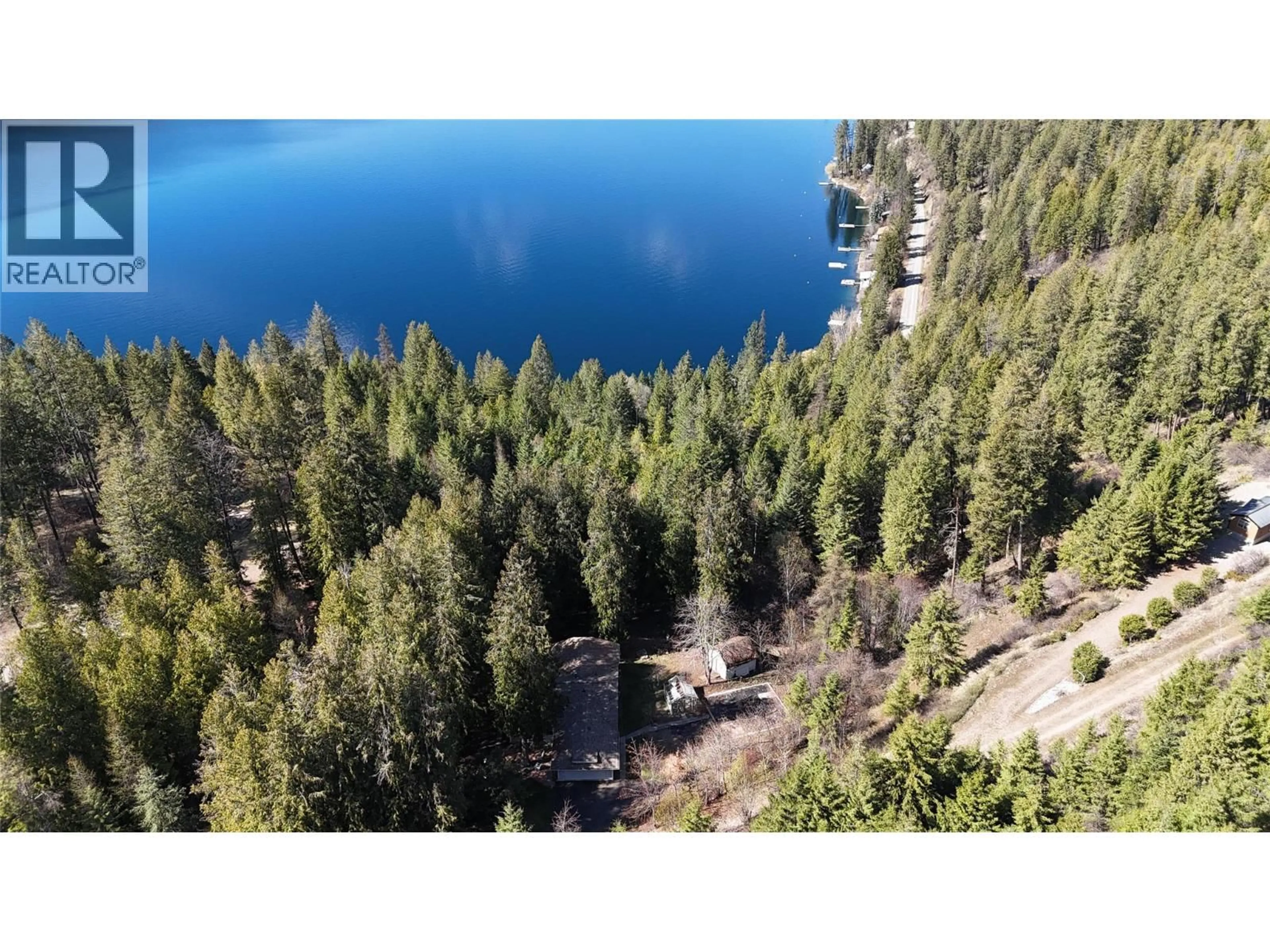 A pic from outside/outdoor area/front of a property/back of a property/a pic from drone, water/lake/river/ocean view for 3150 HAMA ROAD, Christina Lake British Columbia V0H1E0