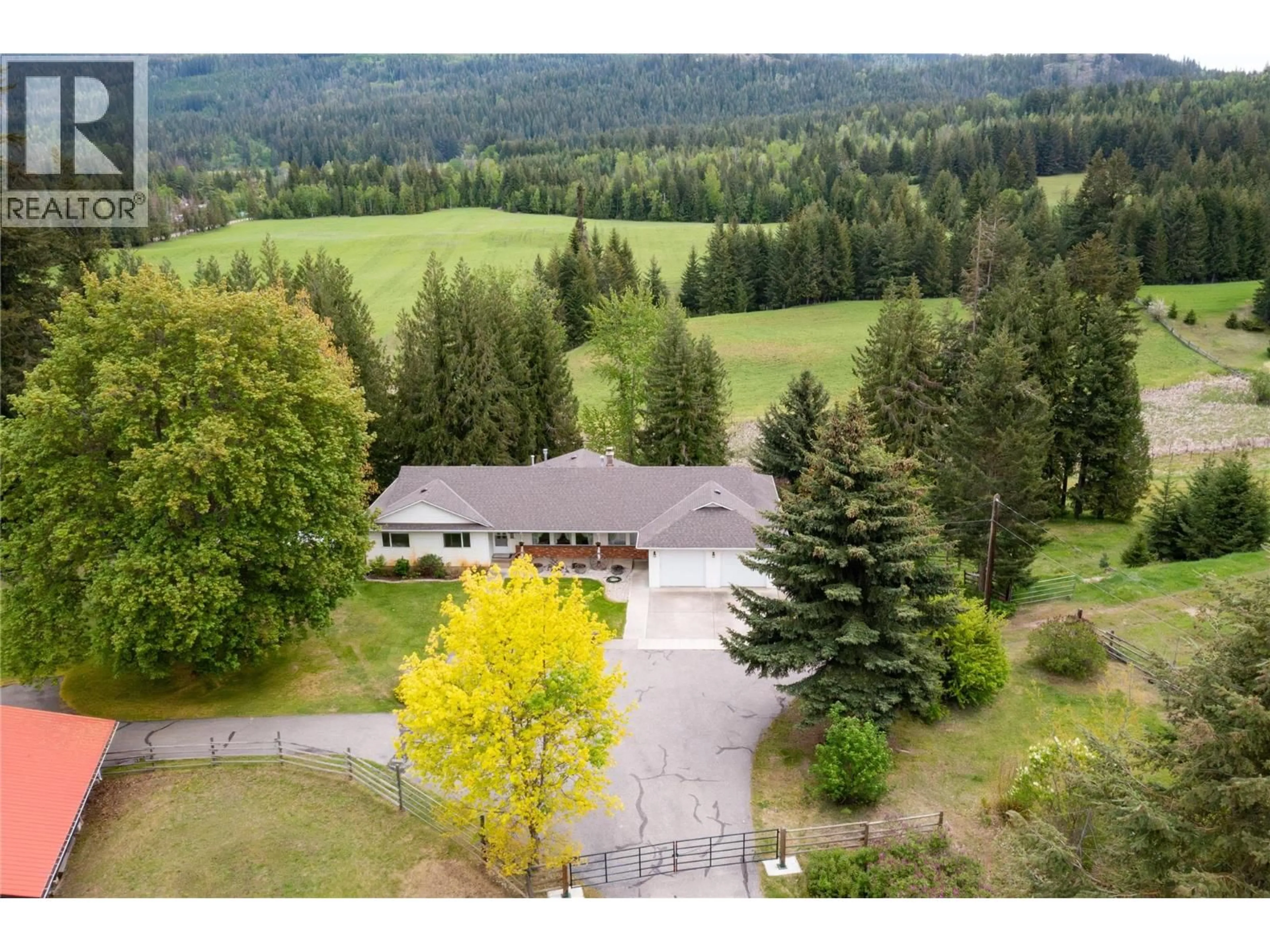 A pic from outside/outdoor area/front of a property/back of a property/a pic from drone, forest/trees view for 2240 97B HIGHWAY SOUTHEAST, Salmon Arm British Columbia V1E1X6