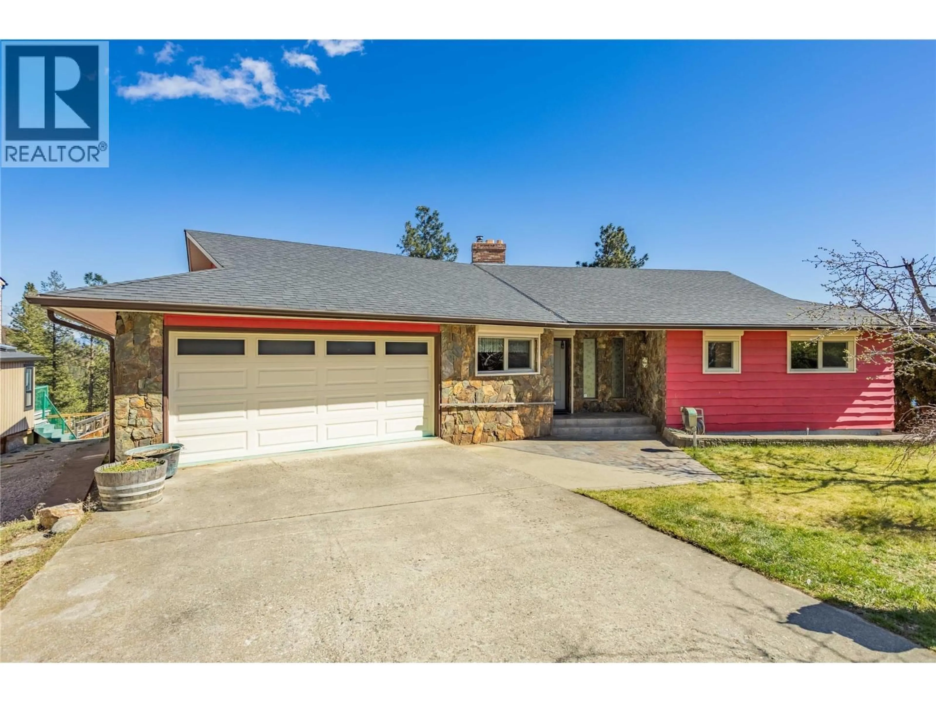 Home with brick exterior material, street for 3915 TREPANIER HEIGHTS AVENUE, Peachland British Columbia V0H1X2