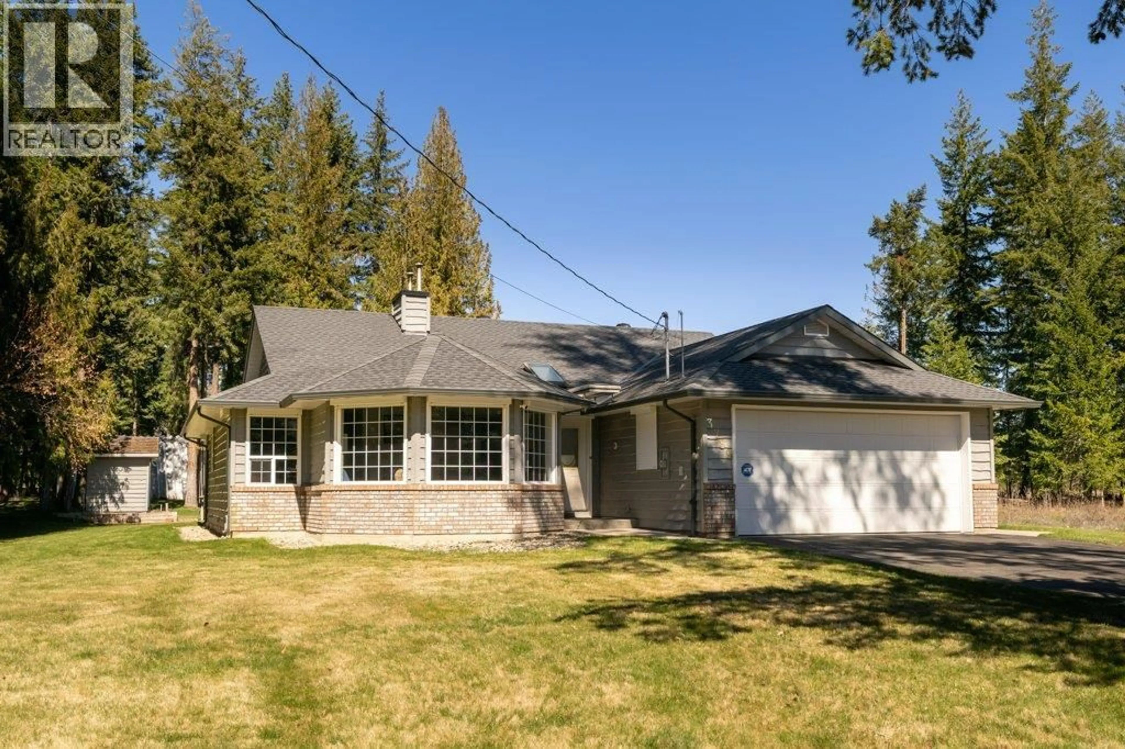 Home with vinyl exterior material, street for 3789 ZINCK ROAD, Scotch Creek British Columbia V0E1M5