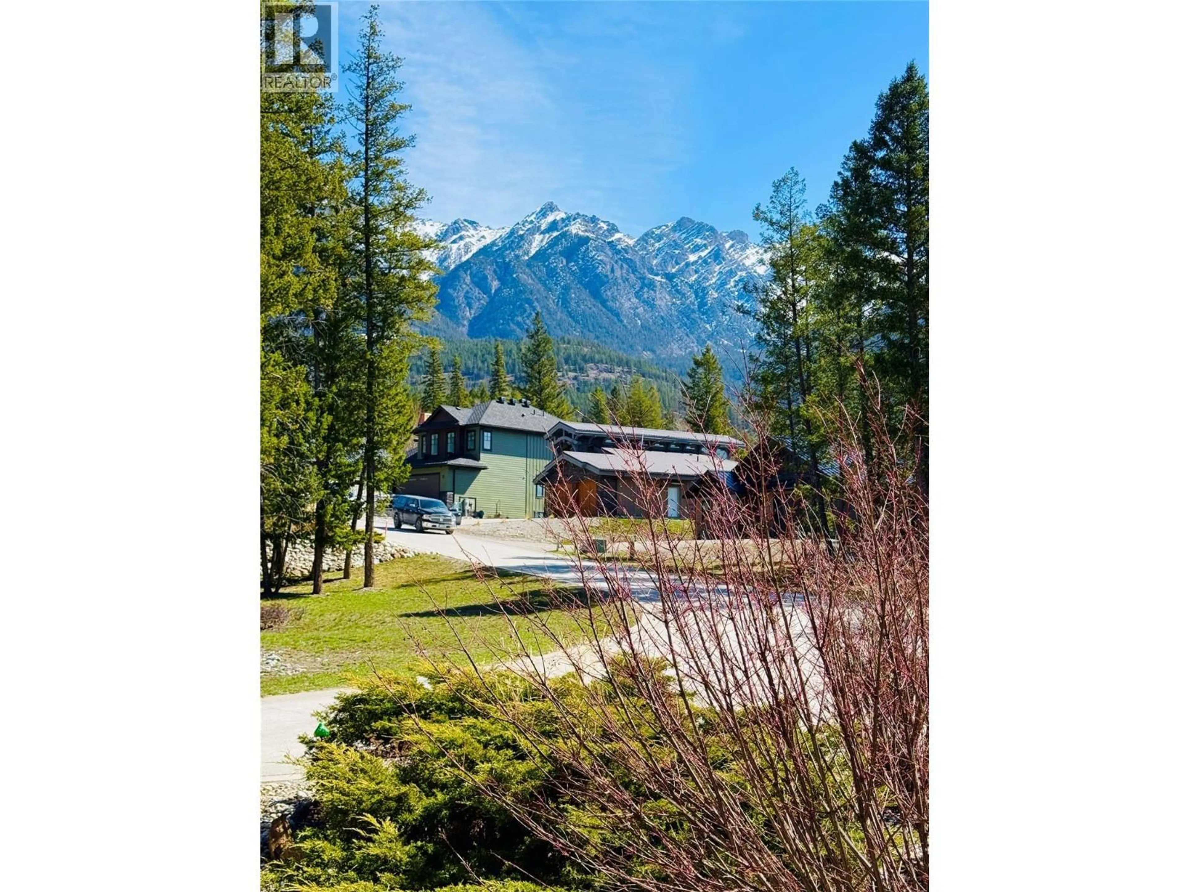 A pic from outside/outdoor area/front of a property/back of a property/a pic from drone, mountain view for 4997 EAGLEBROOK COURT, Fairmont Hot Springs British Columbia V0B1L1