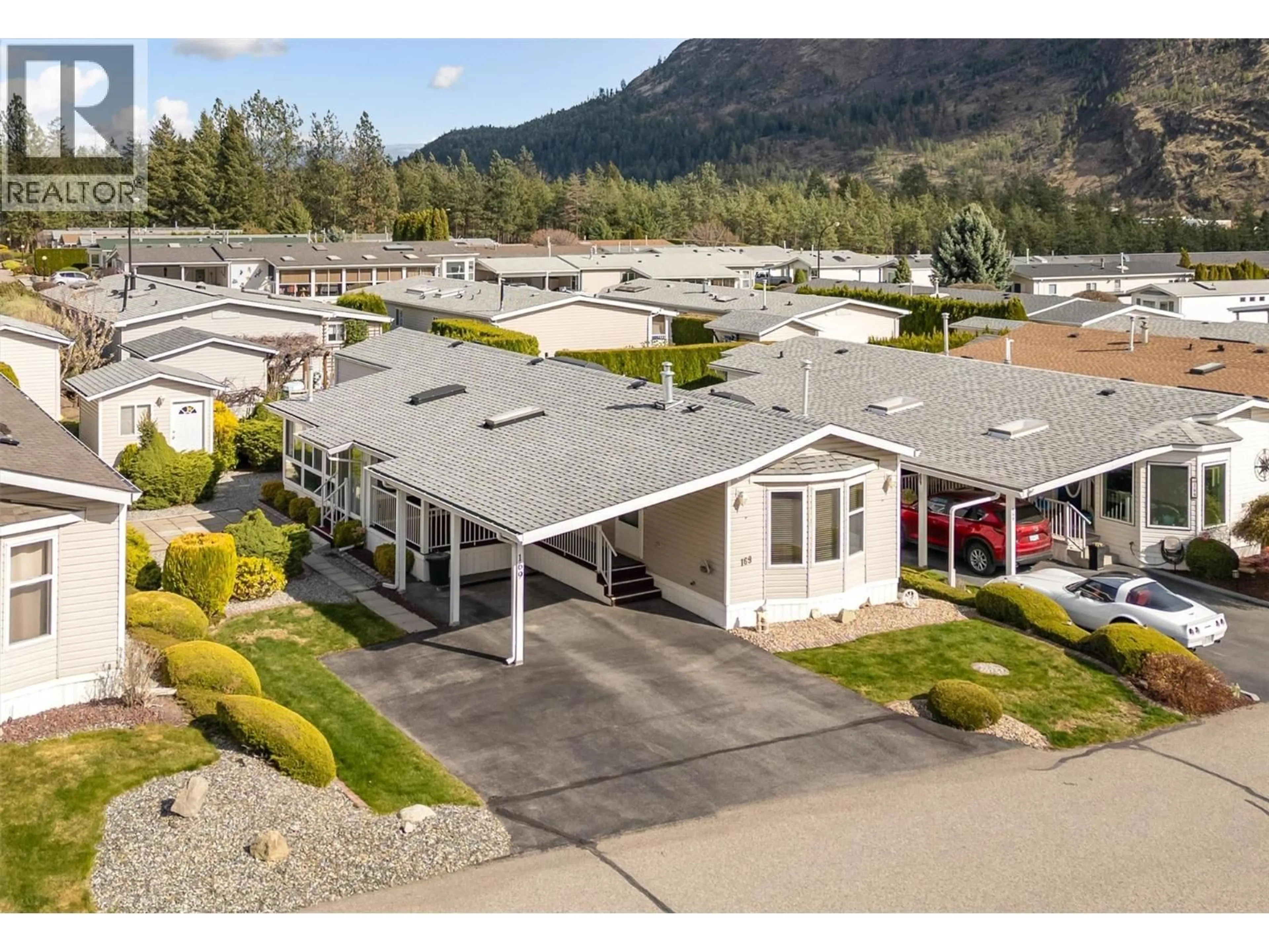 A pic from outside/outdoor area/front of a property/back of a property/a pic from drone, mountain view for 169 - 1850 SHANNON LAKE ROAD, West Kelowna British Columbia V4T1L6